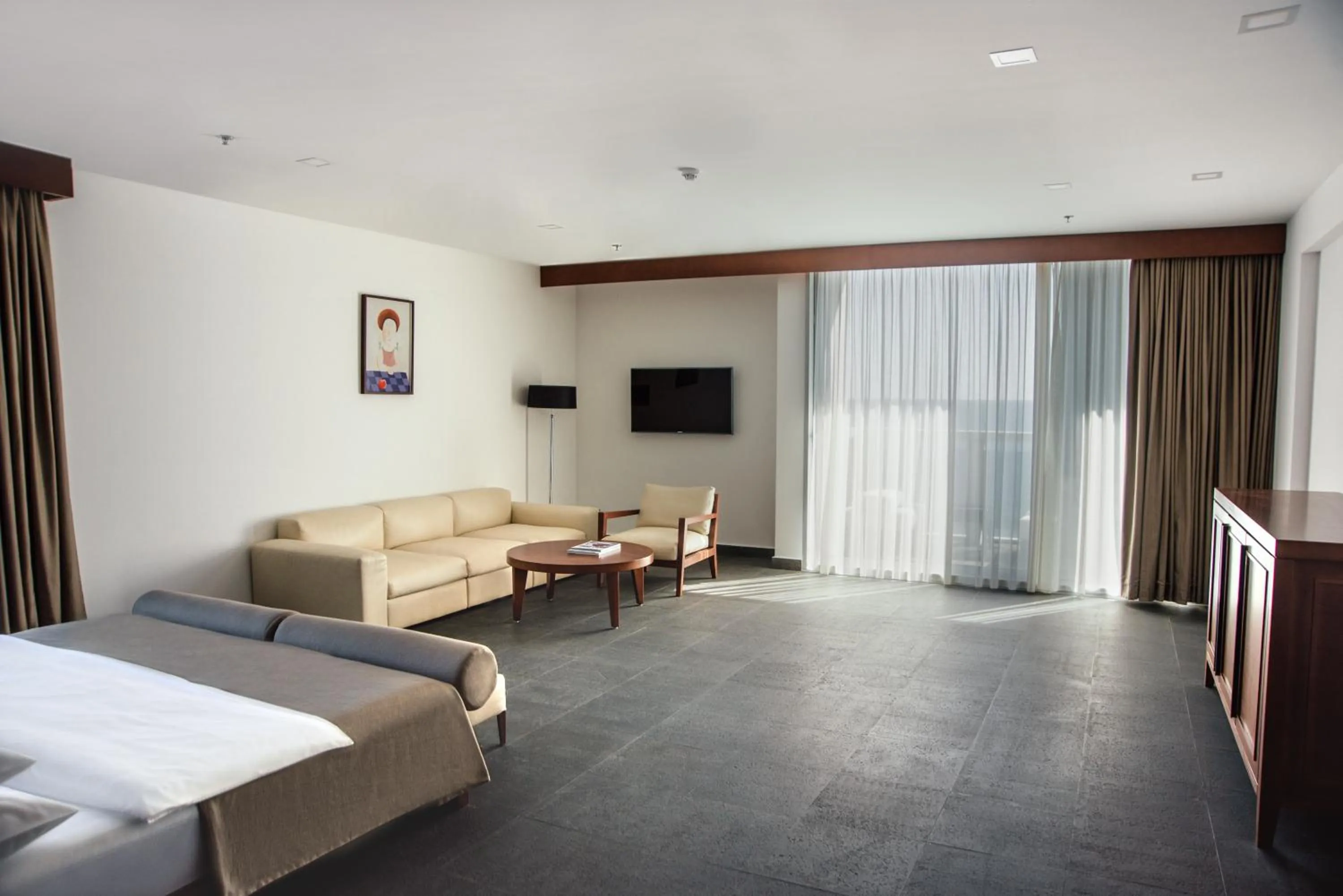 Seating area, Bed in Avala Resort & Villas