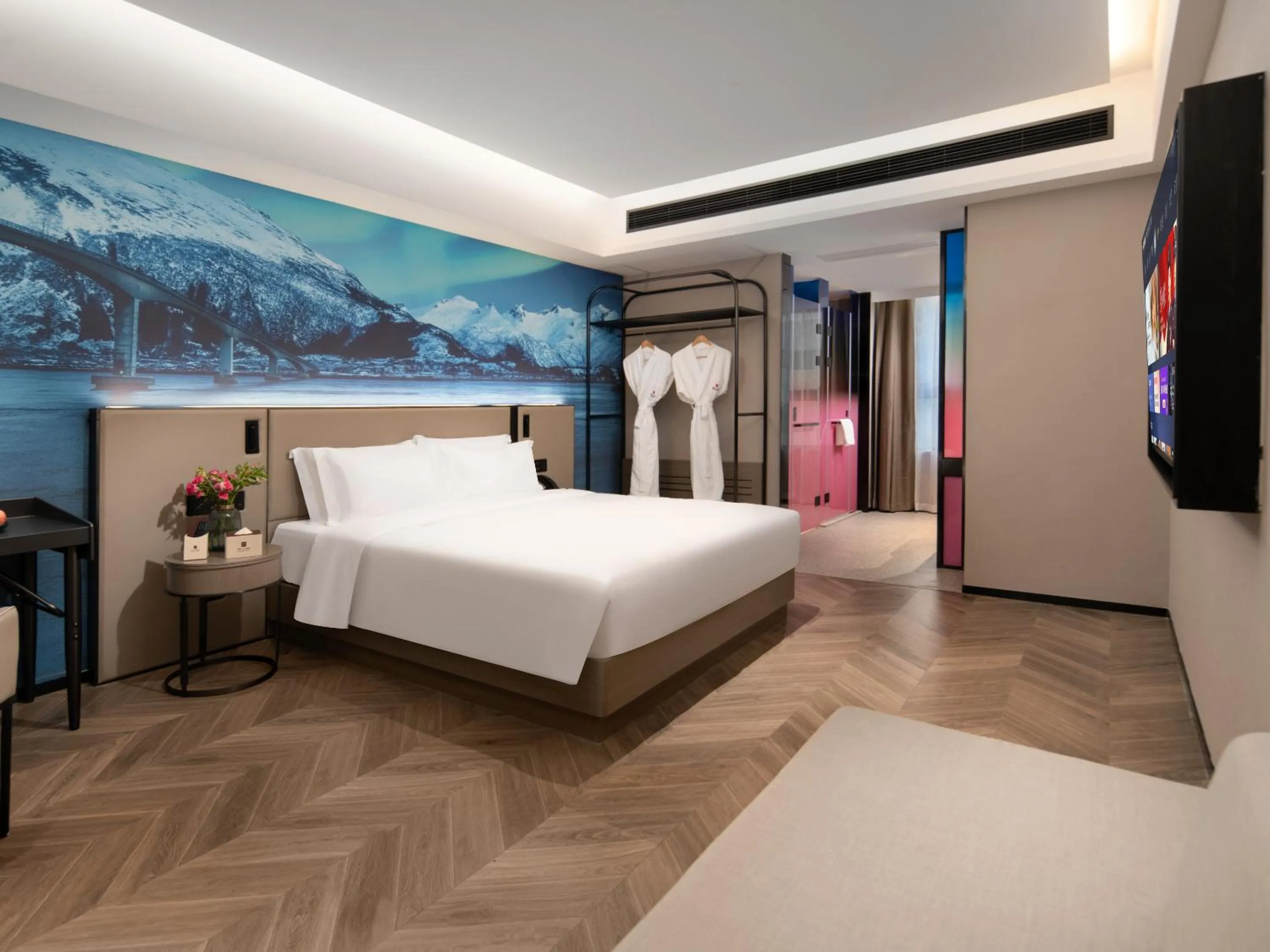Bed in Echarm PLUS International Hotel Zhujiang New Town Wuyangcun Metro Station