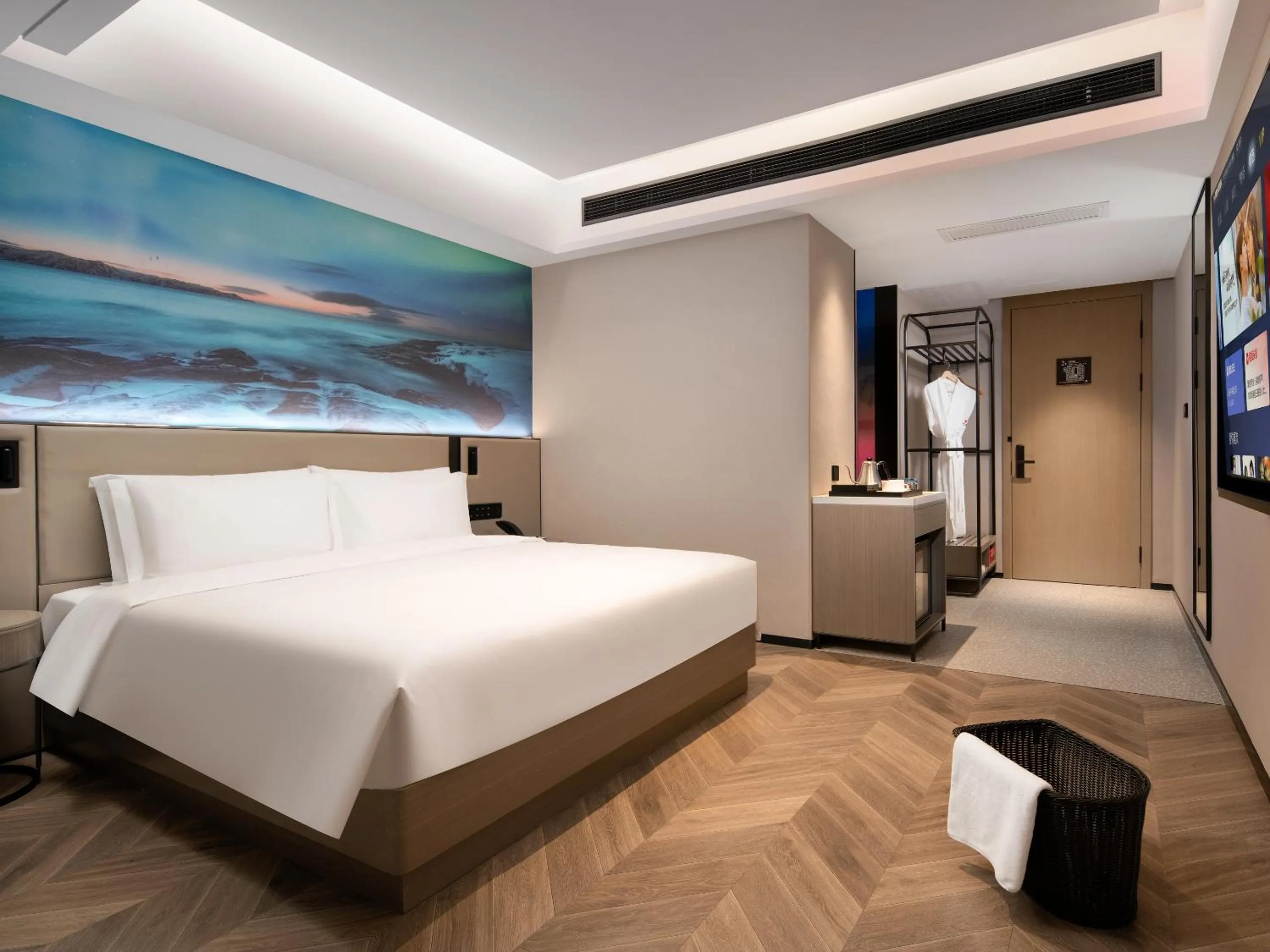 Bed in Echarm PLUS International Hotel Zhujiang New Town Wuyangcun Metro Station