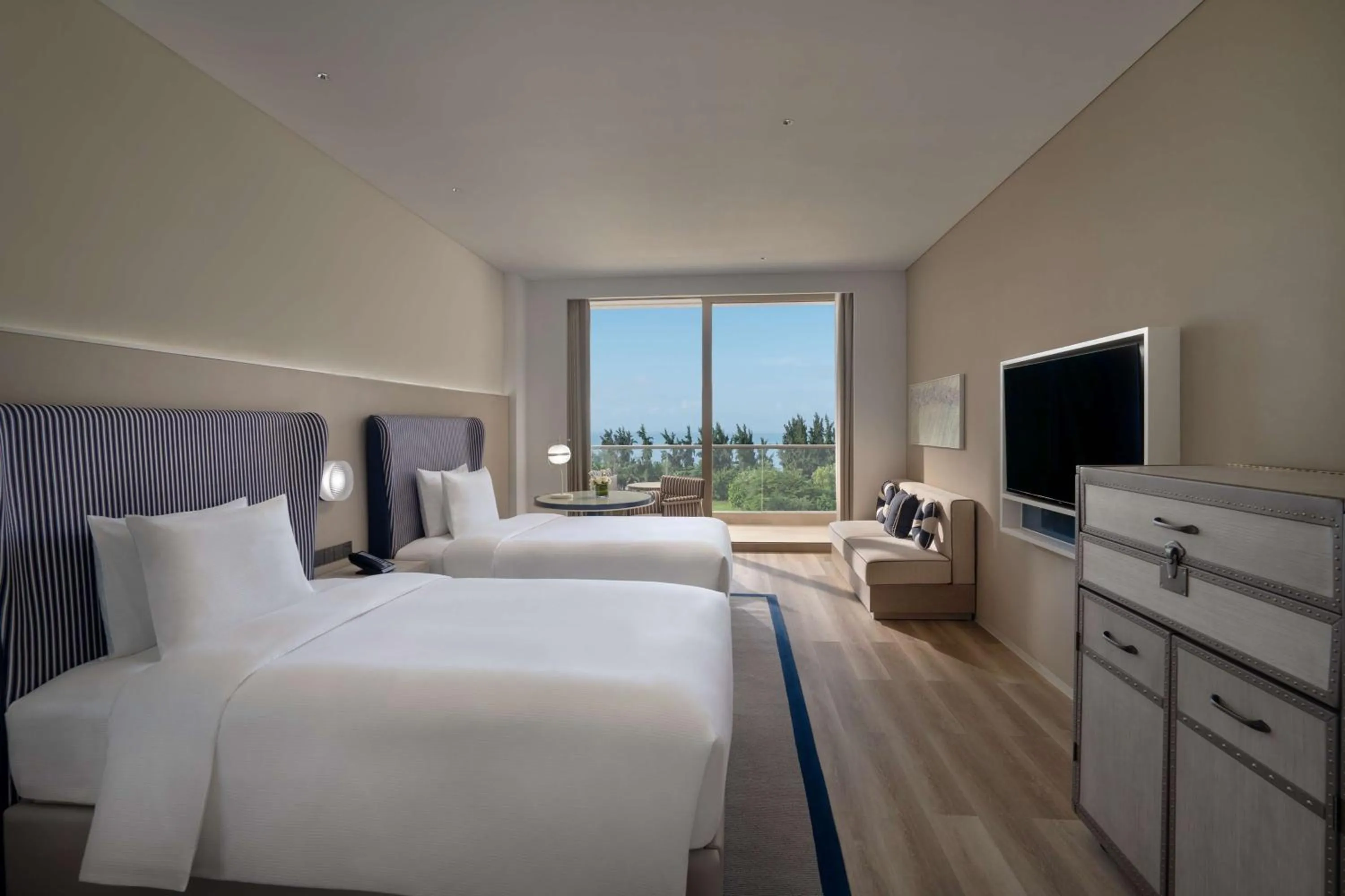 Bed in The Mermoon Resort Hainan Tufu Bay, Tapestry By Hilton