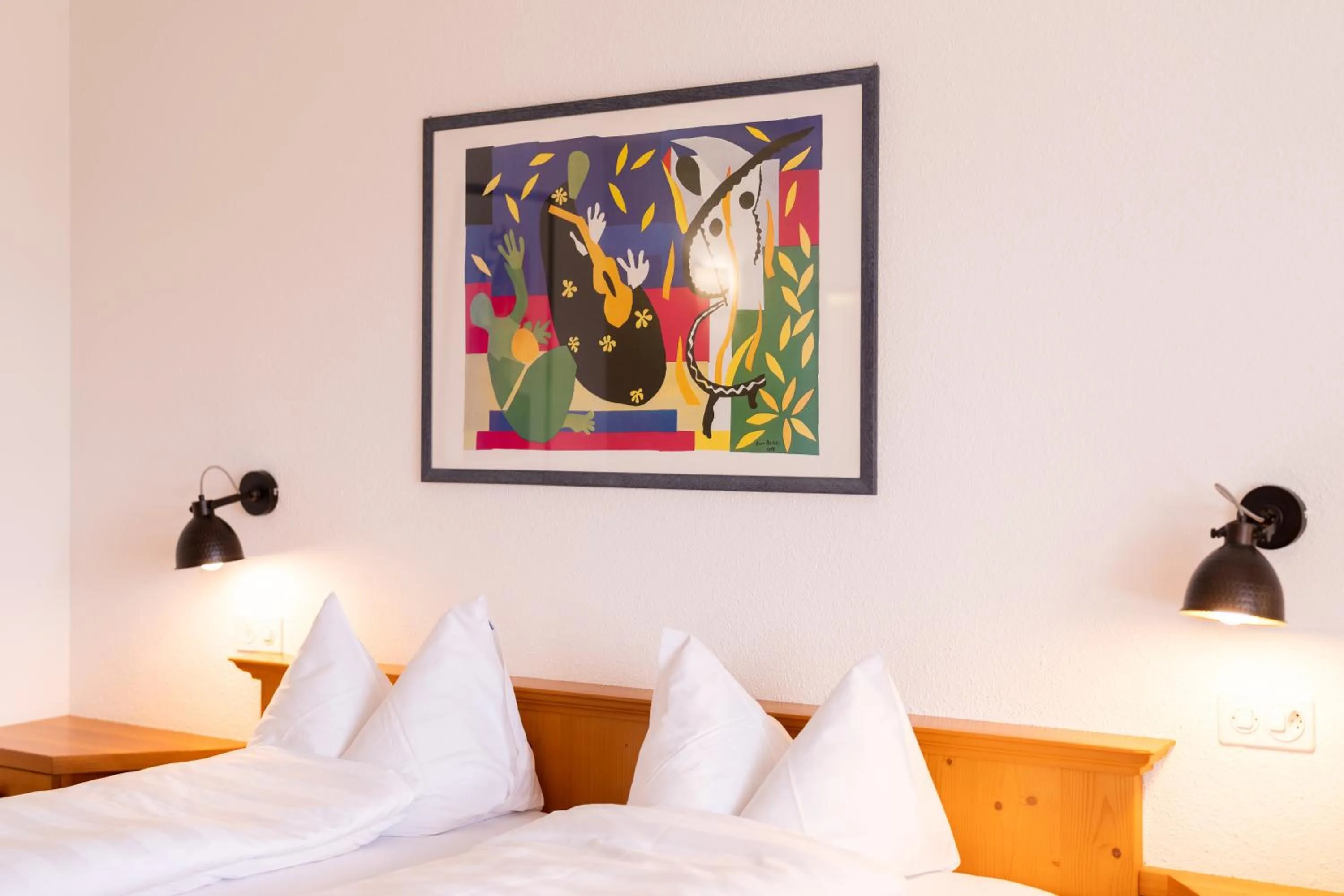 Bed in Hotel Schatzmann