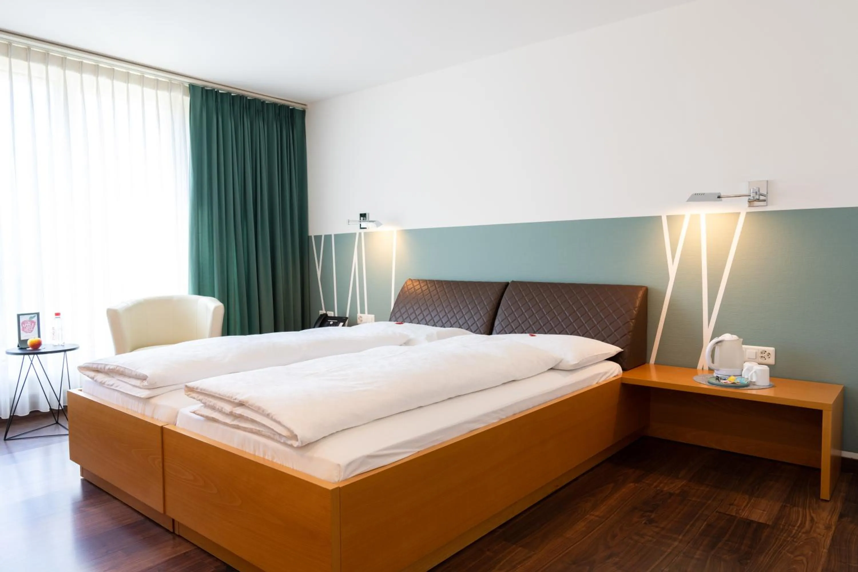 Bed in Hotel Schatzmann