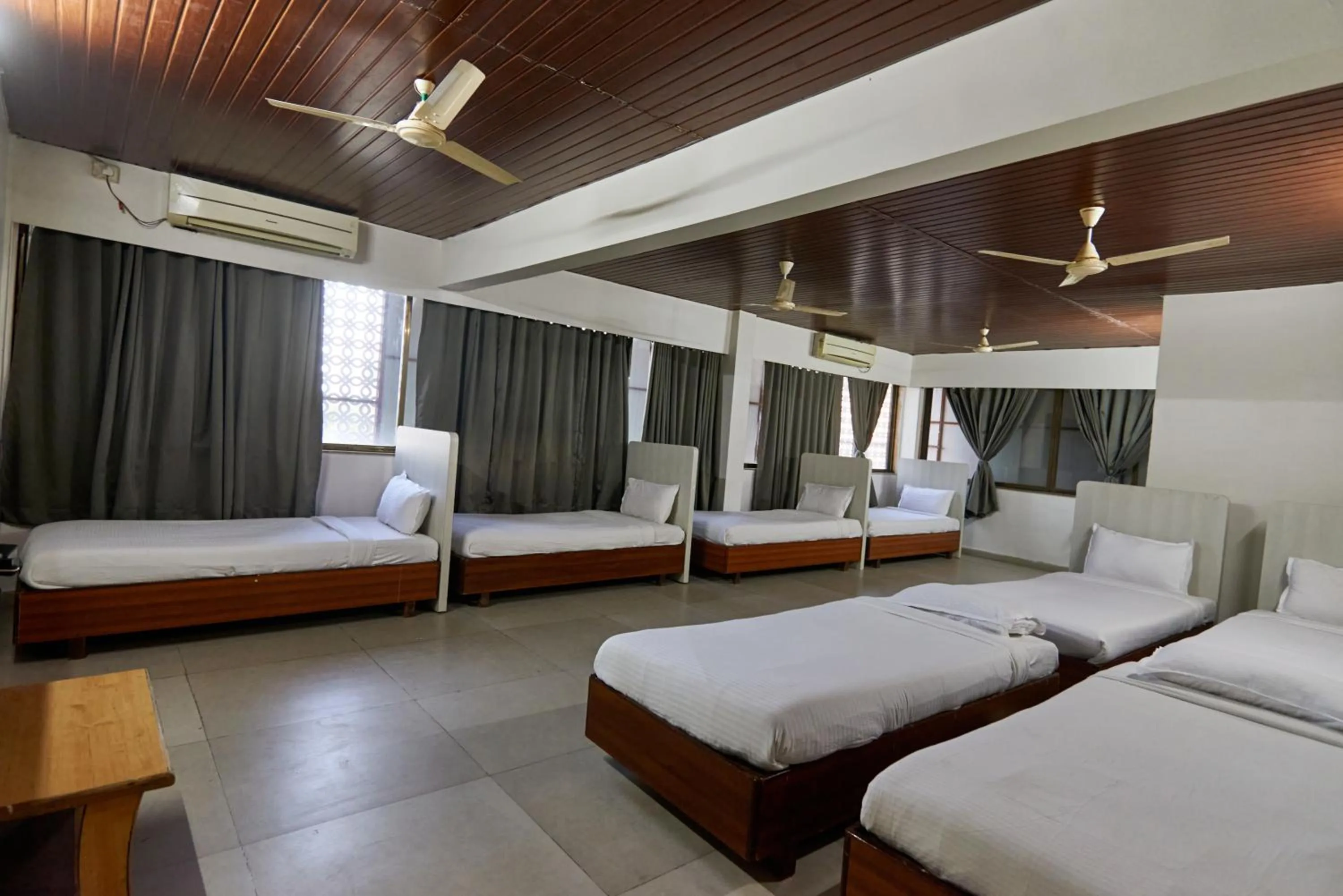 Photo of the whole room, Bed in Hotel Sai Palkhi Niwara