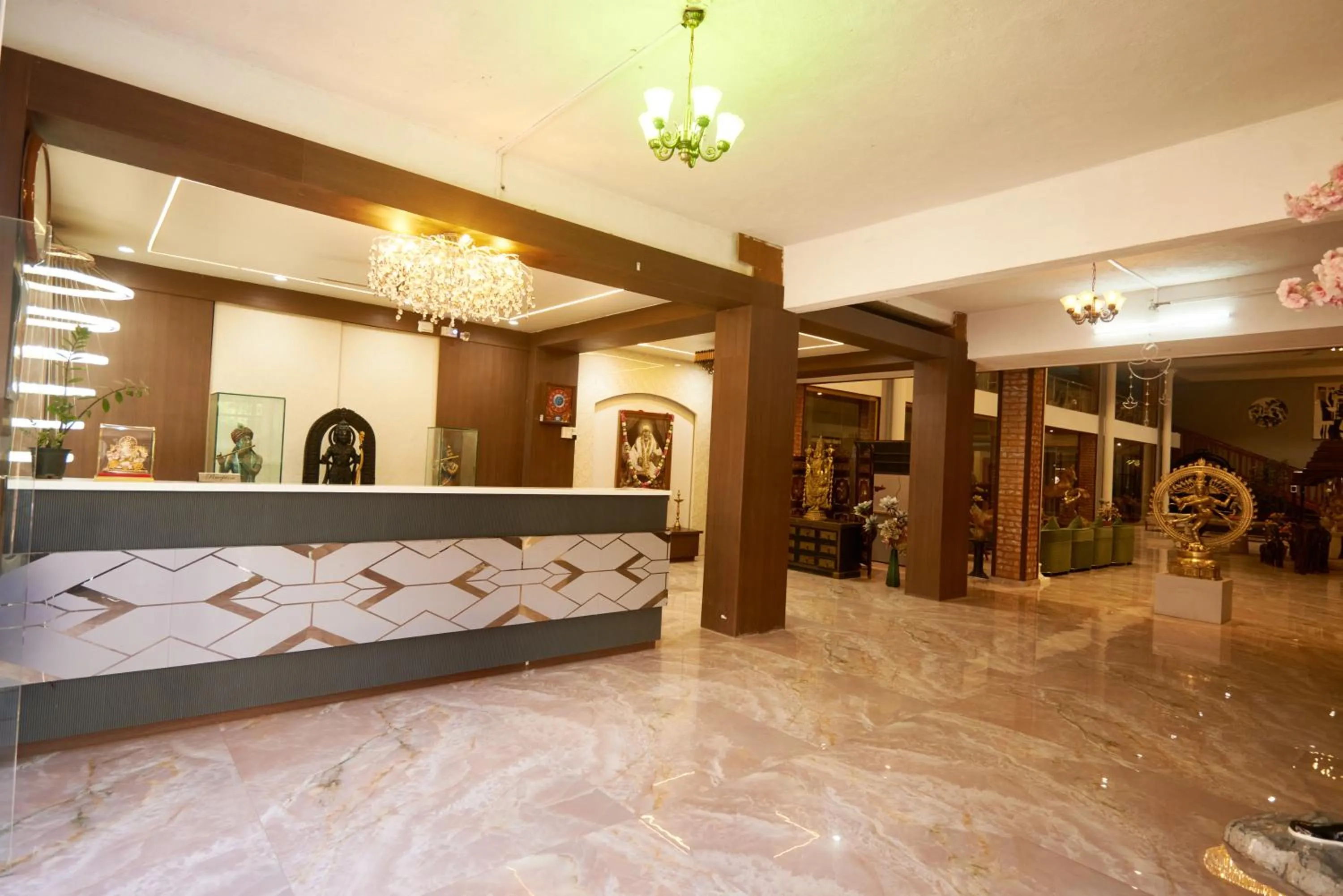 Lobby or reception in Hotel Sai Palkhi Niwara
