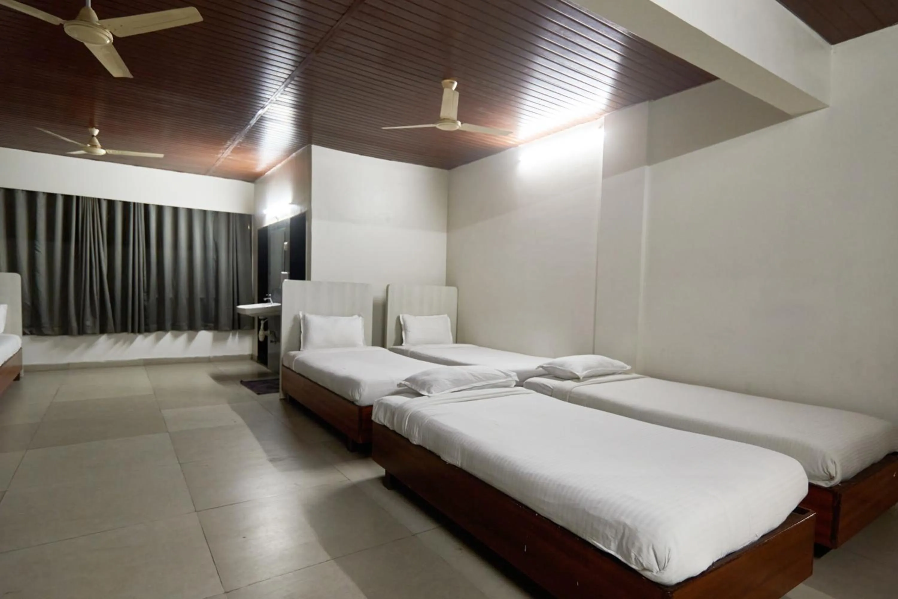 Photo of the whole room, Bed in Hotel Sai Palkhi Niwara