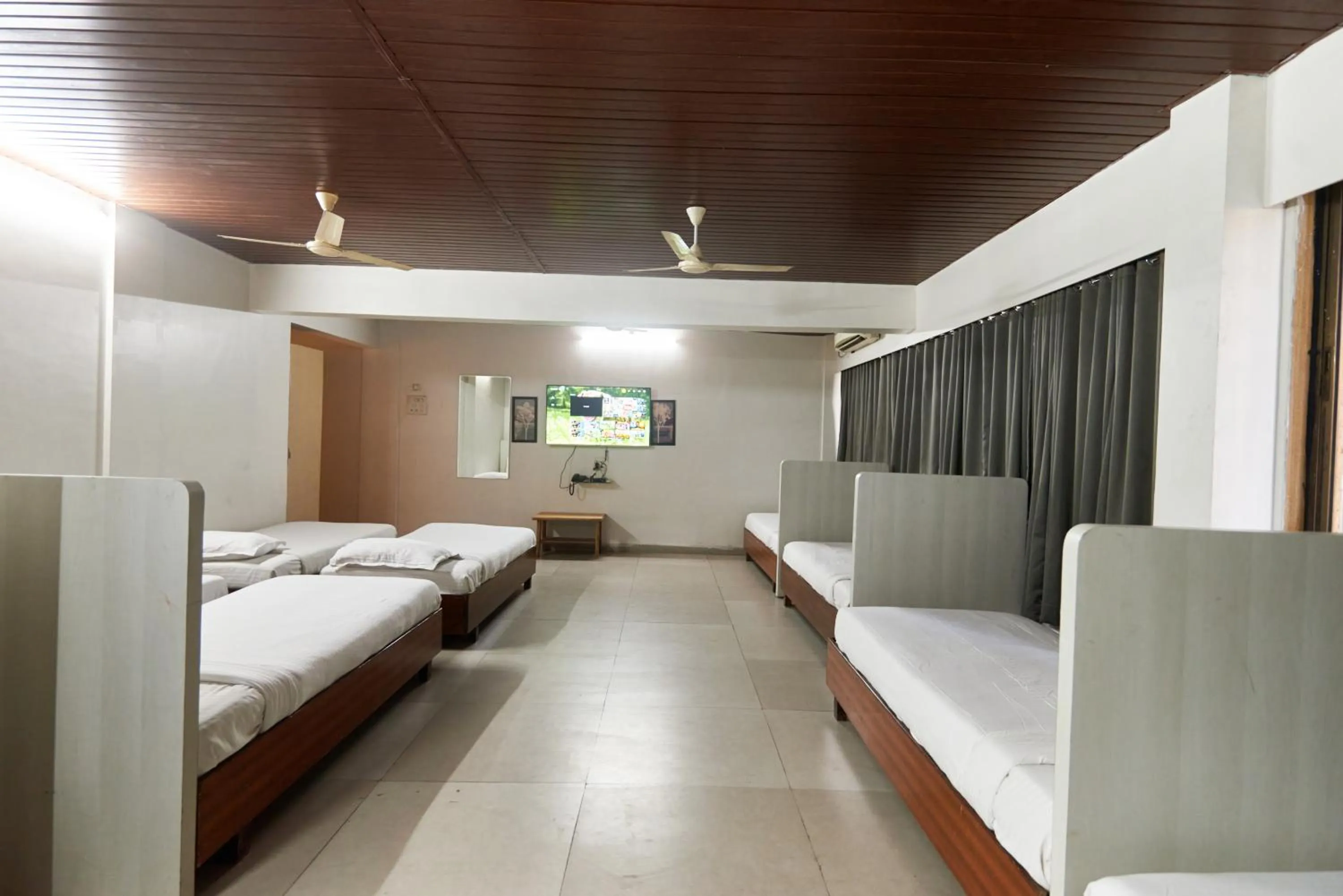 Photo of the whole room, Bed in Hotel Sai Palkhi Niwara