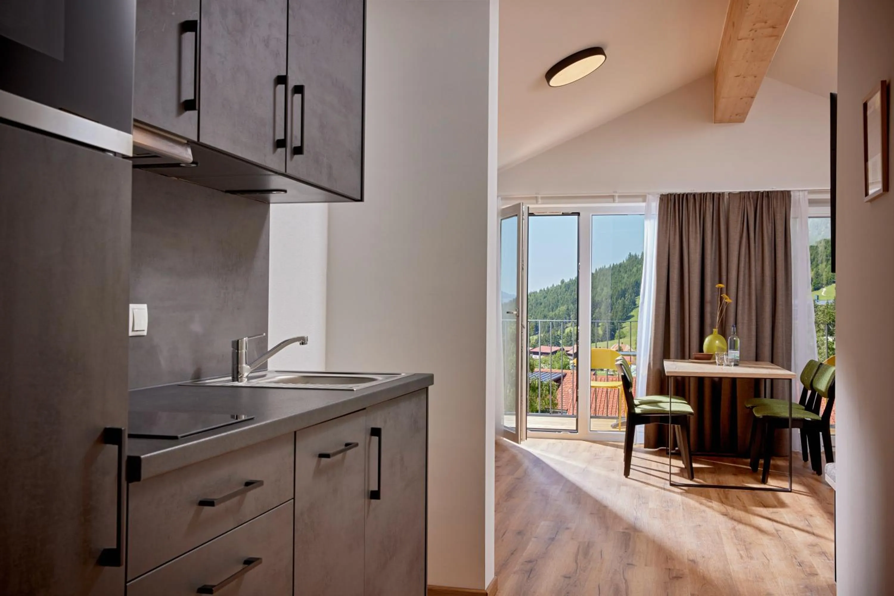 Kitchen or kitchenette in BergBuddies - Übernachtung inklusive kostenlosen Bergbahntickets und vielem mehr