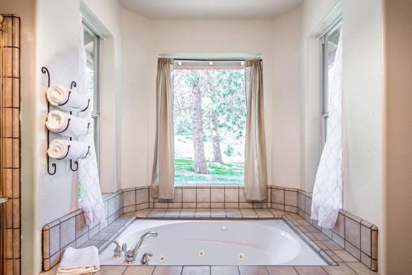 Bed in Forest Cabin by China Creek