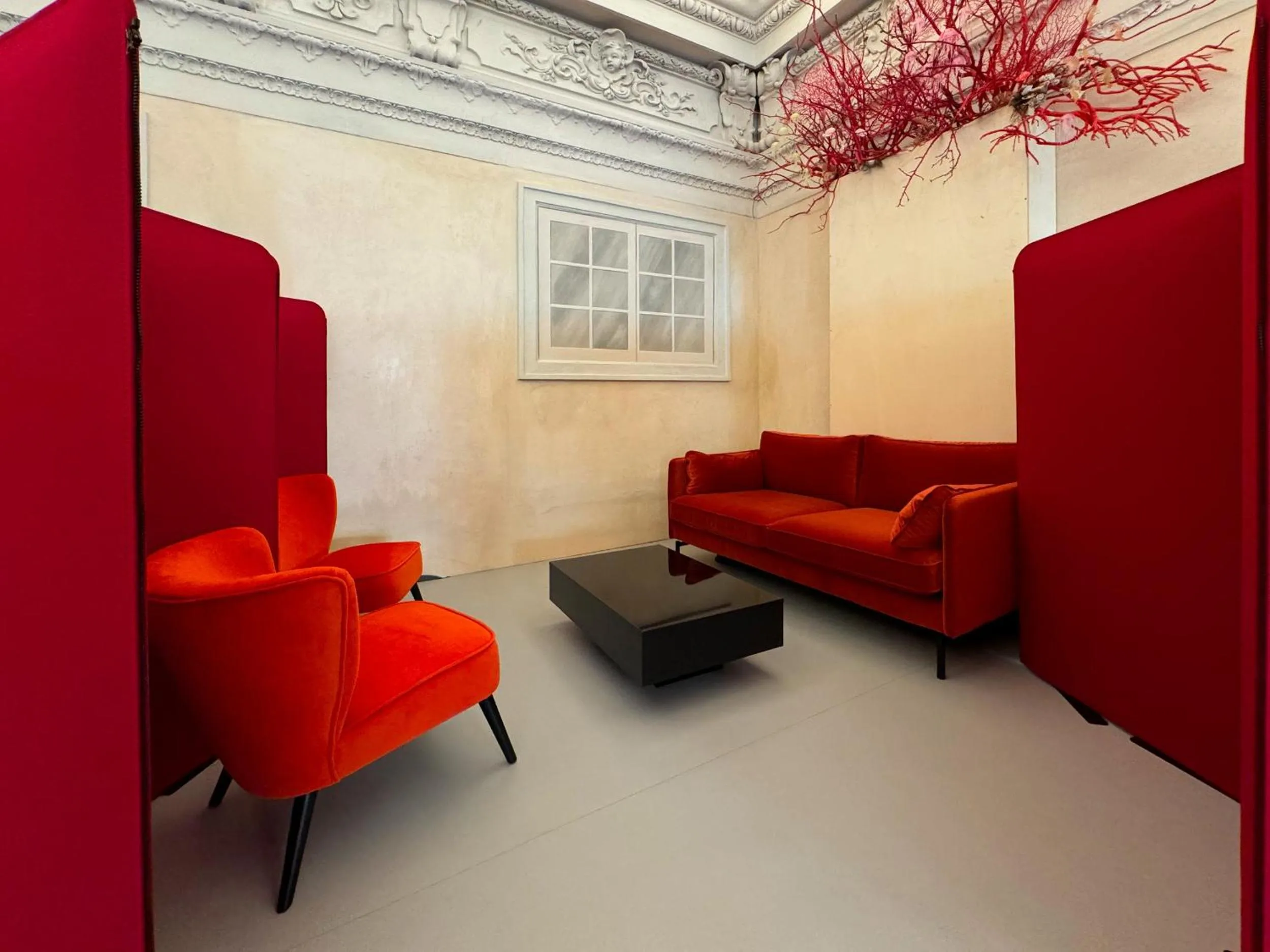 Communal lounge/ TV room in Hotel Palazzo Durazzo Suites