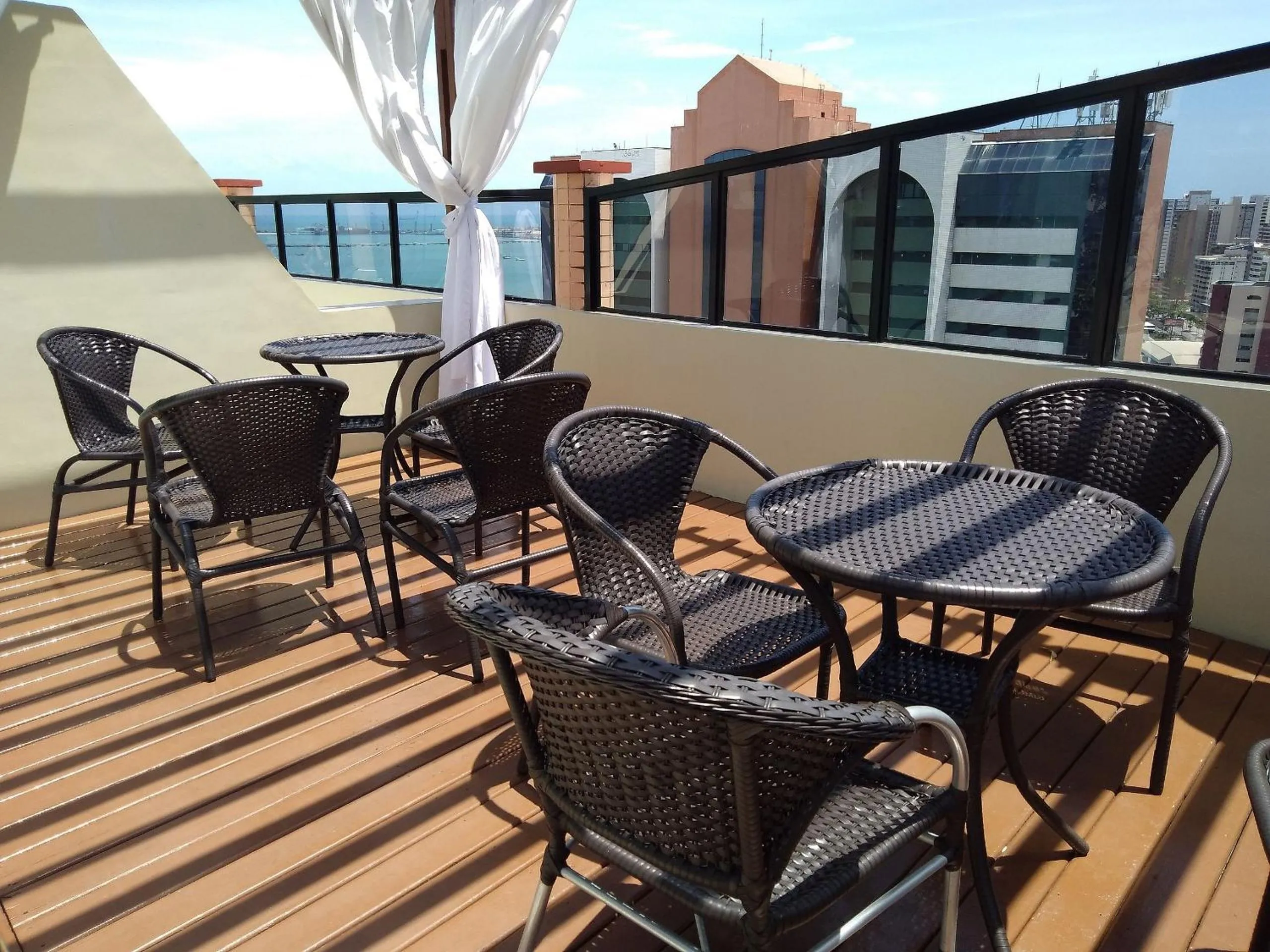 Patio in Flat Brasil Tropical Meireles by Escala