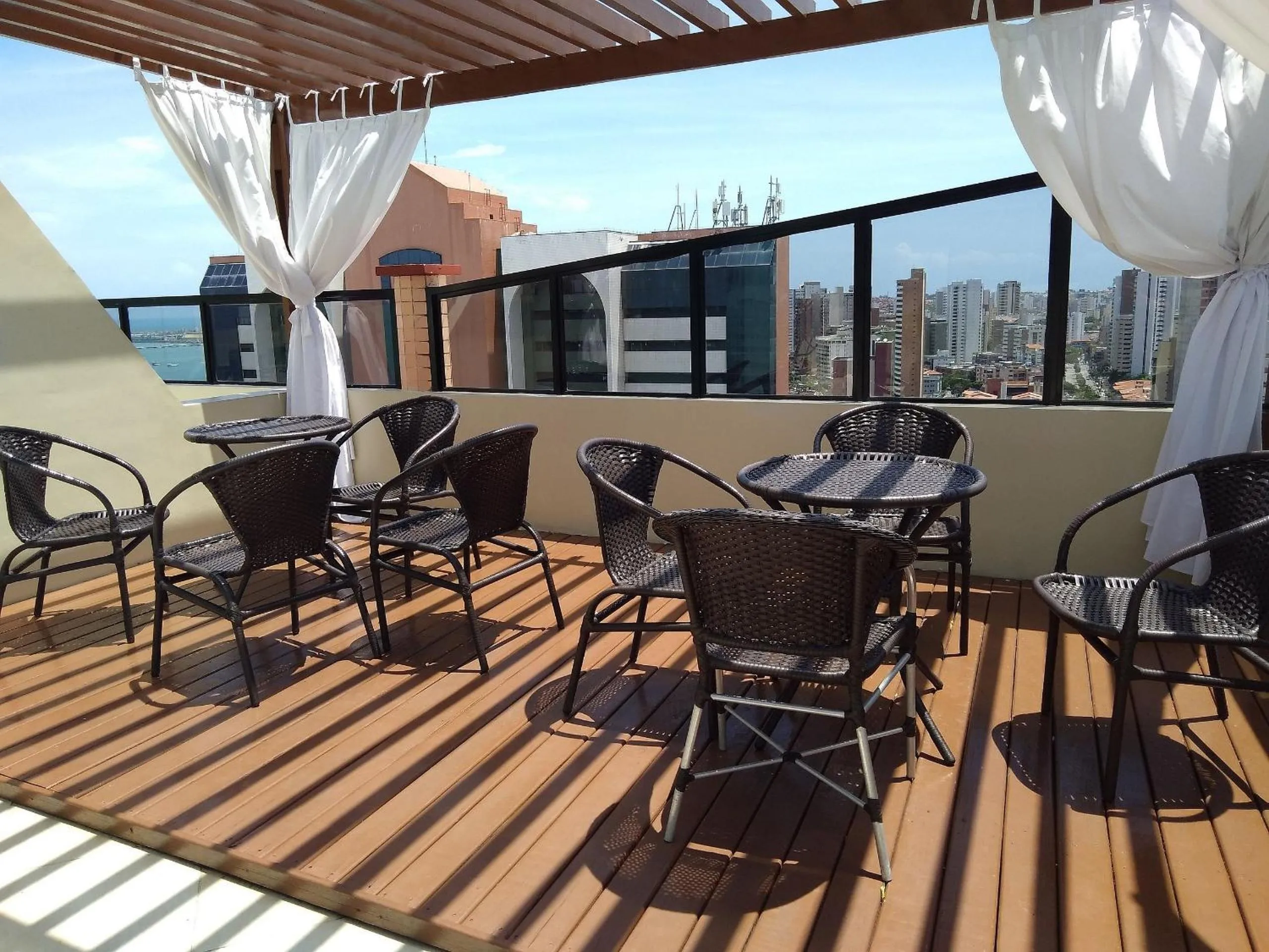 Patio in Flat Brasil Tropical Meireles by Escala