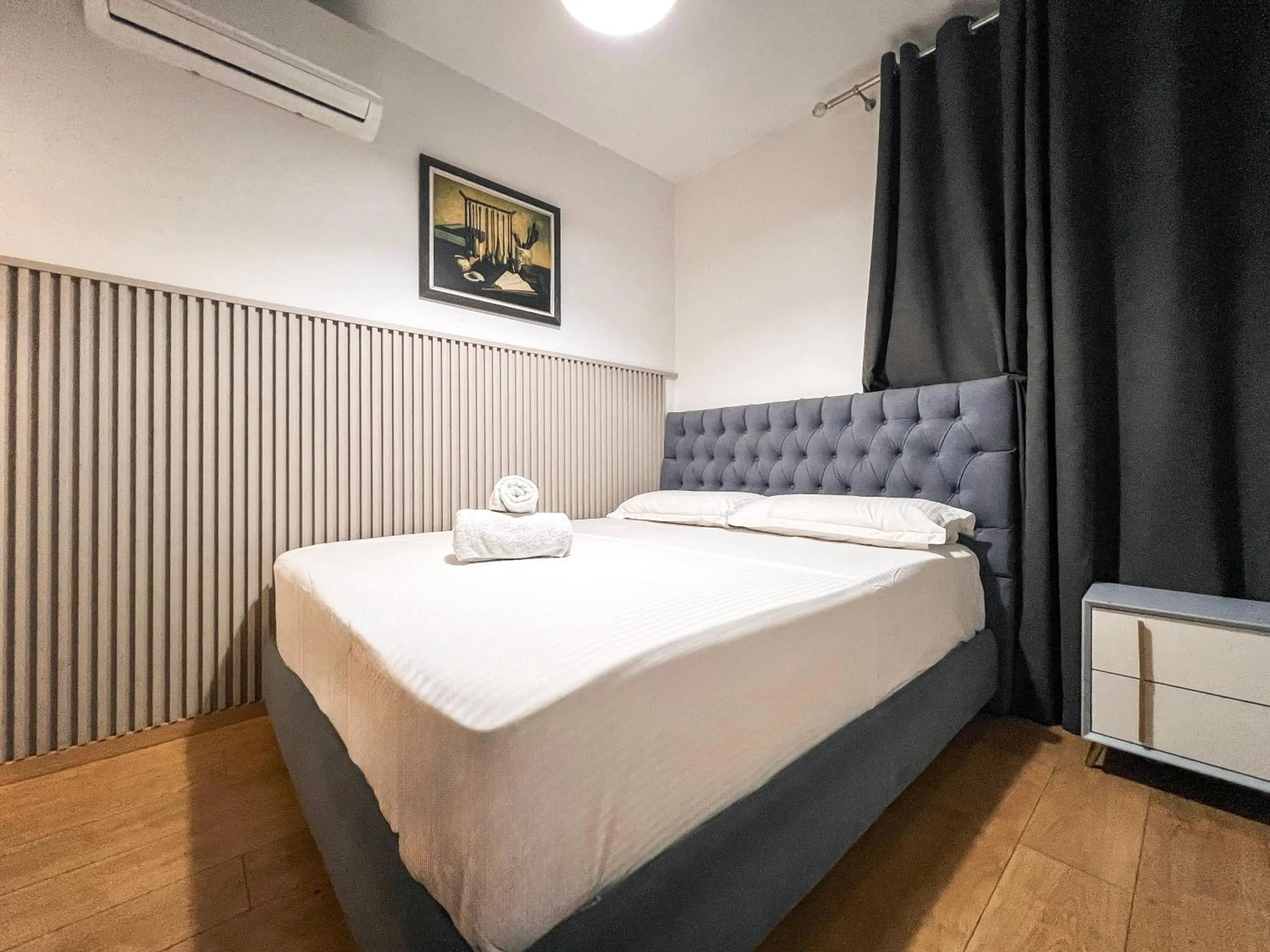 Bed in Hotel Tier Center