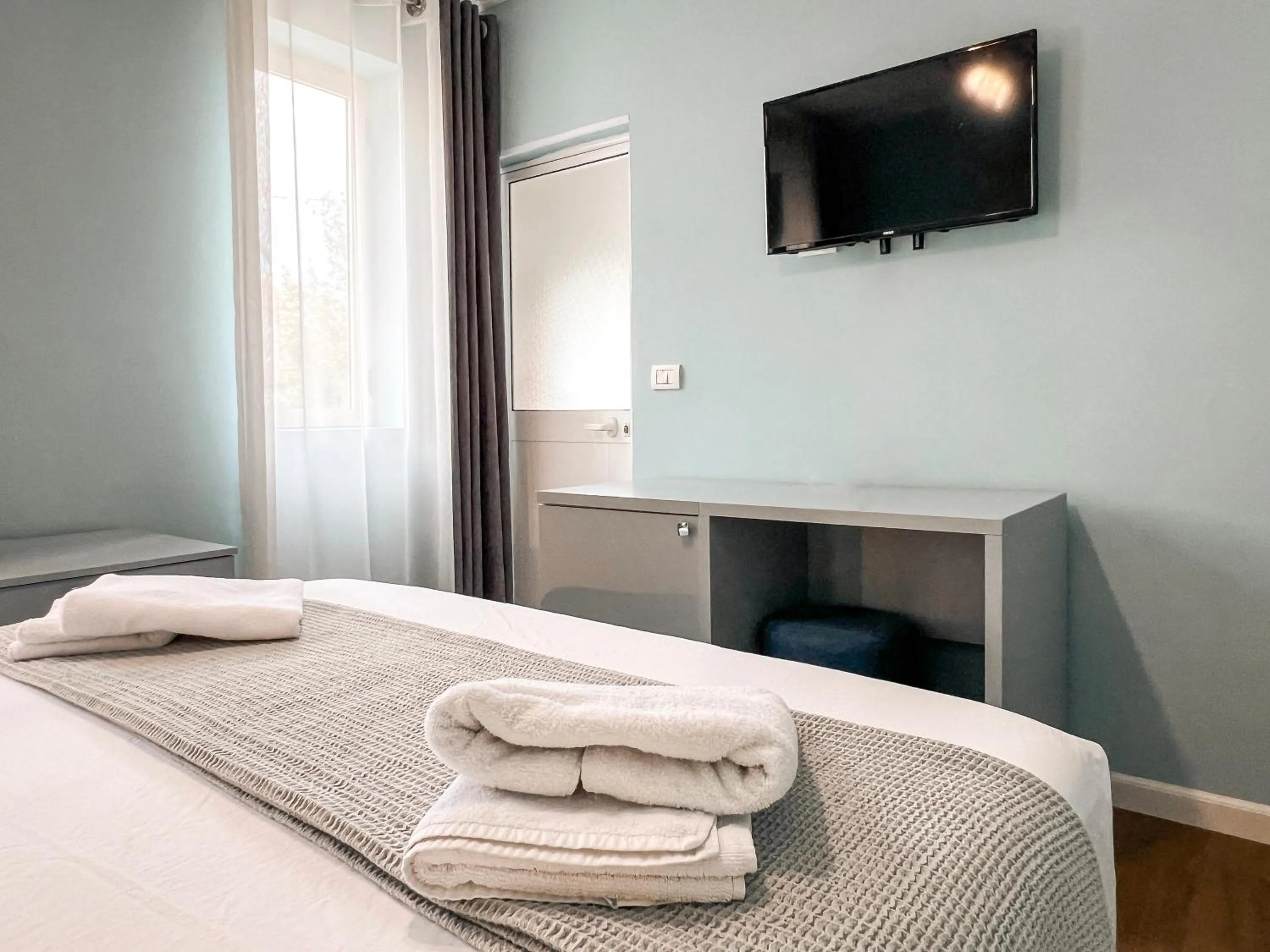 Bed in Hotel Tier Center