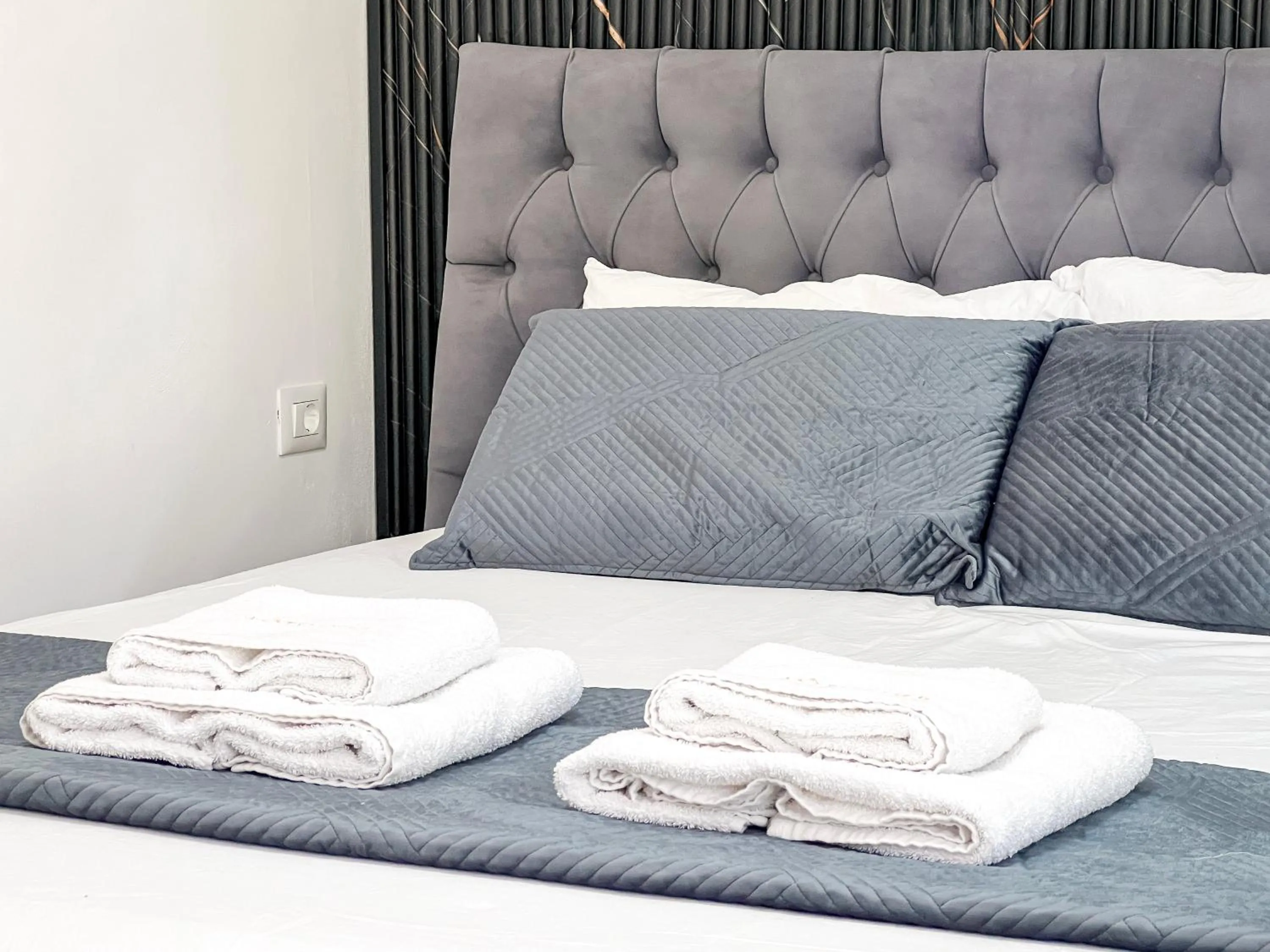 Bed in Hotel Tier Center