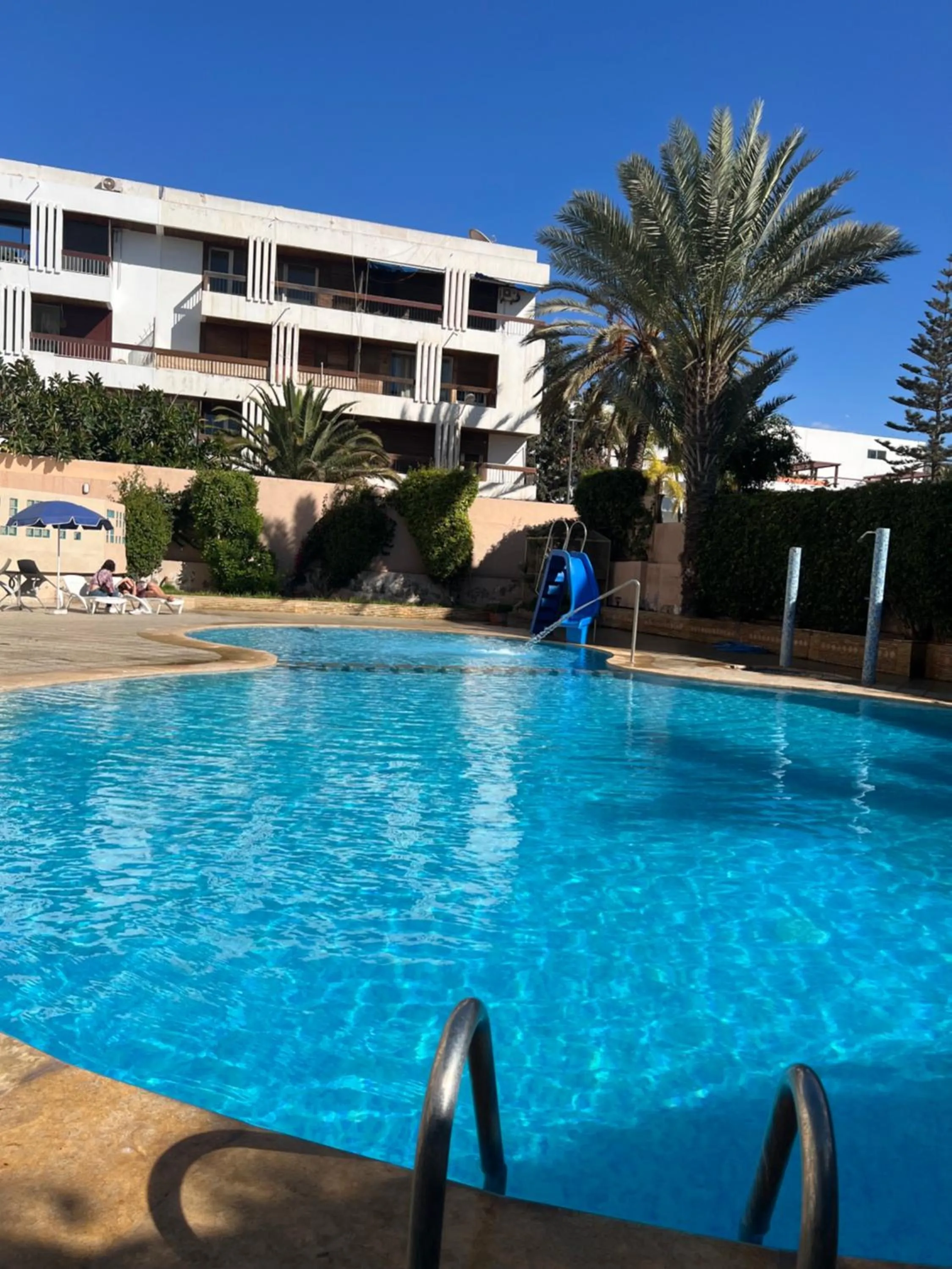 Swimming pool in Hôtel Résidence Louban