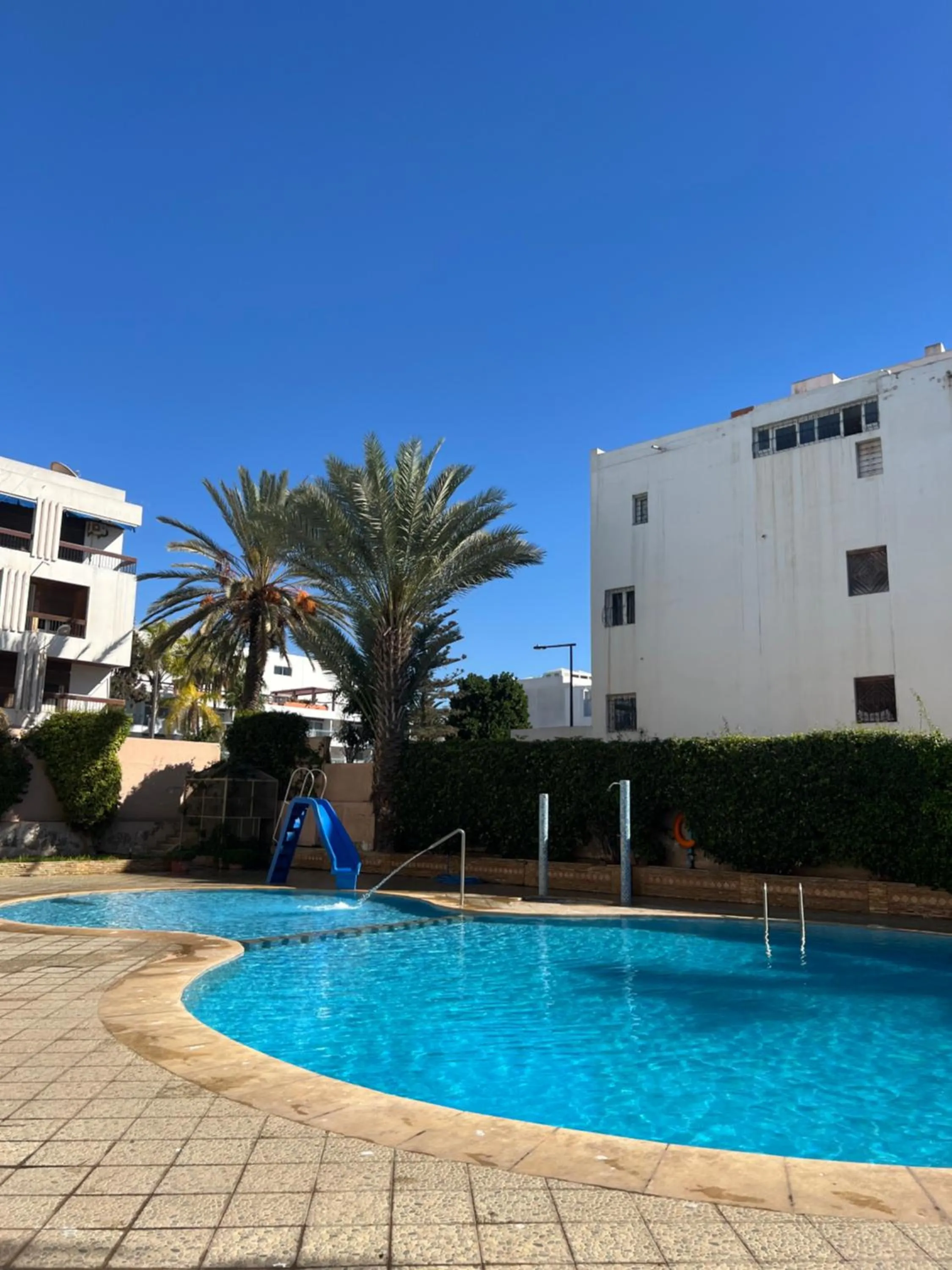 Swimming pool in Hôtel Résidence Louban