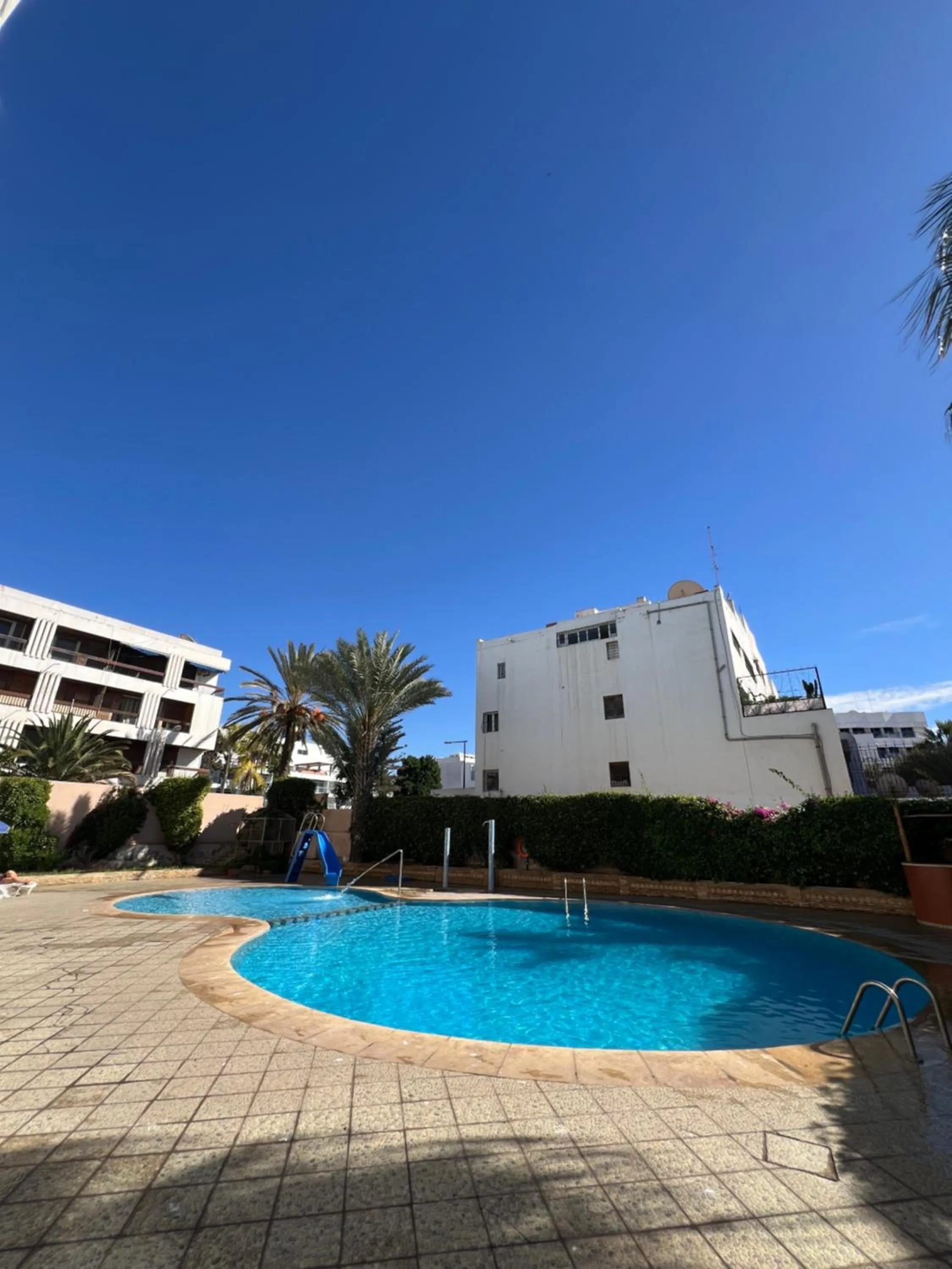 Swimming pool in Hôtel Résidence Louban
