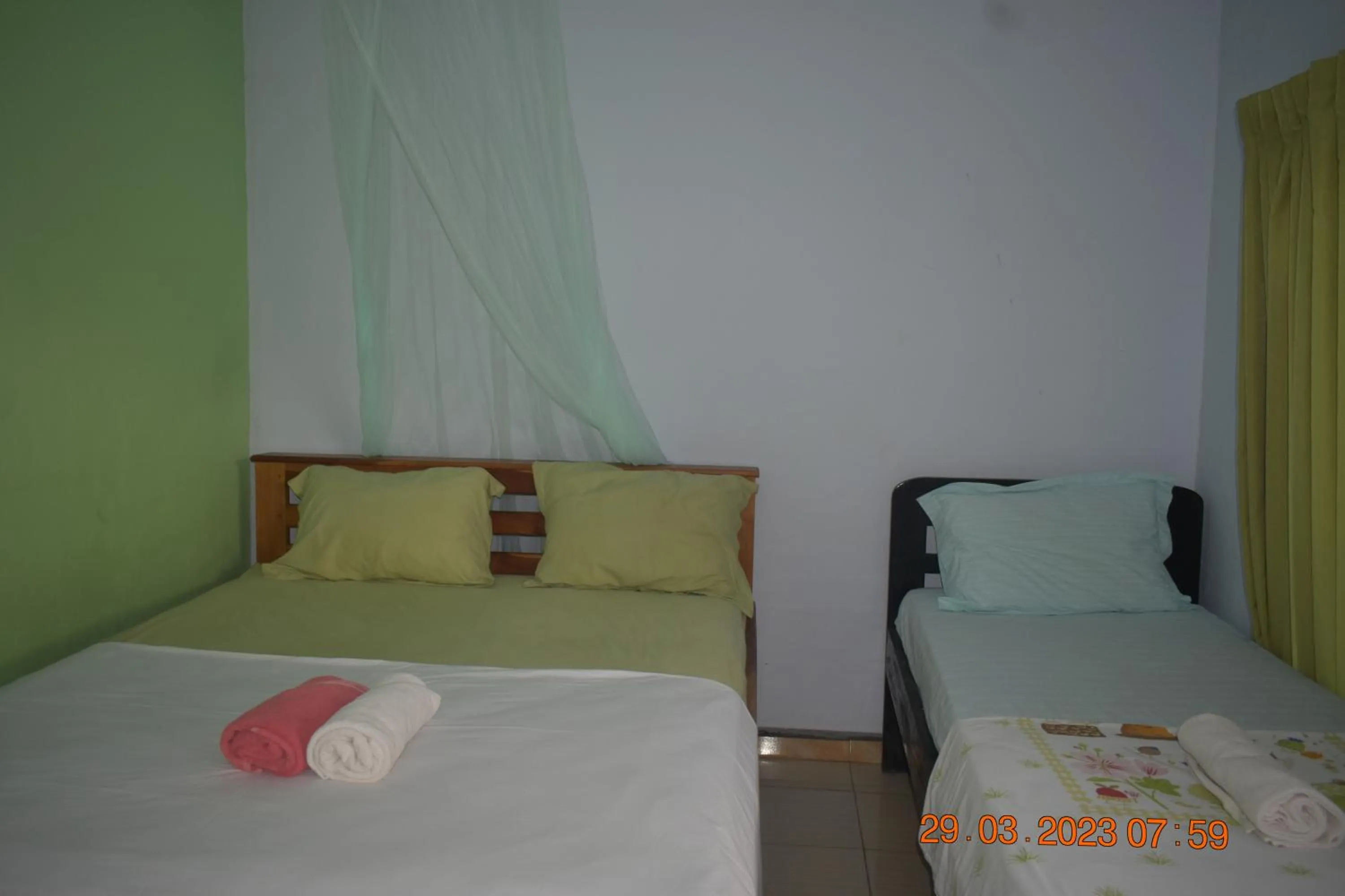 Bed in Del Mar Home Stay