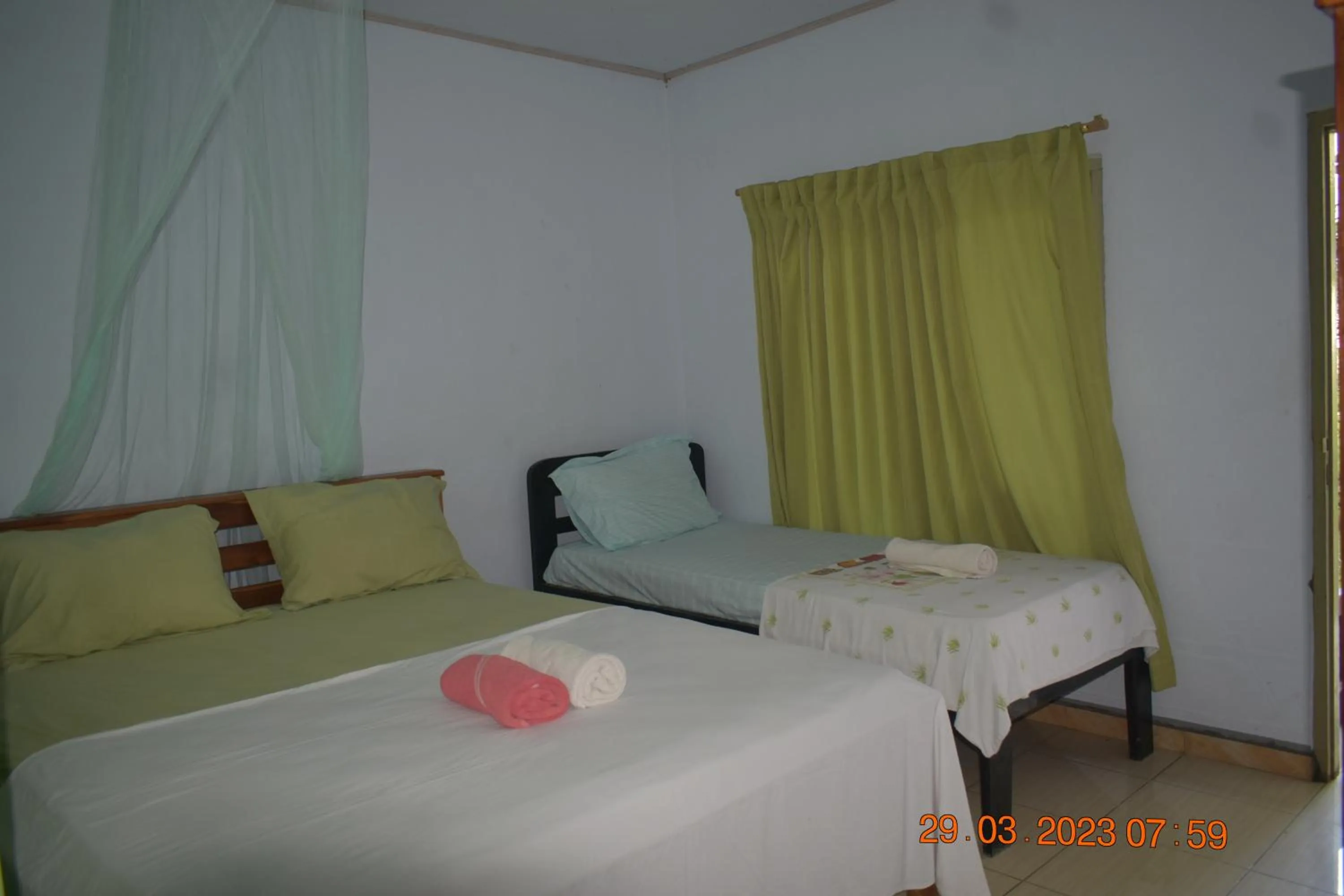 Bed in Del Mar Home Stay