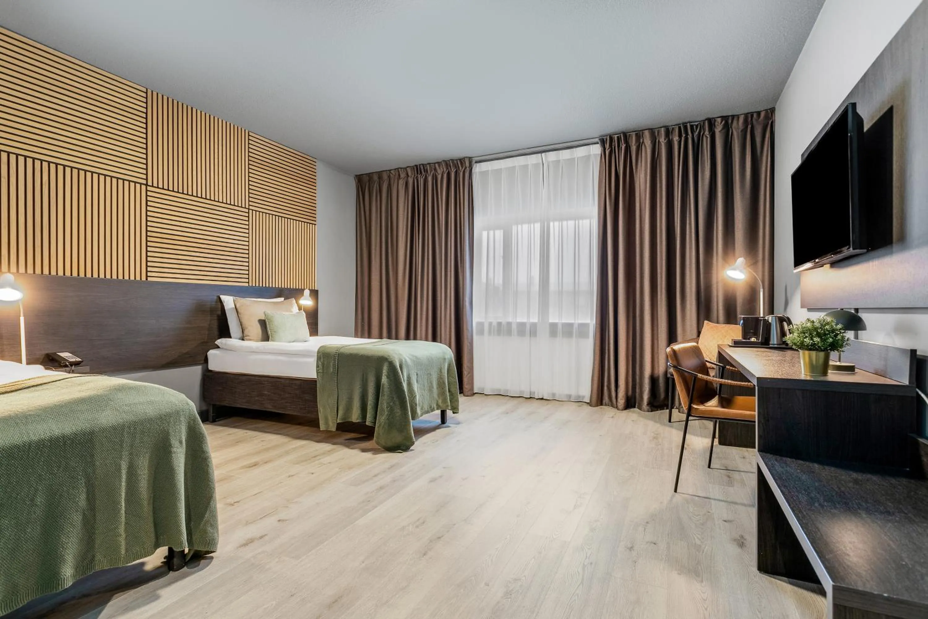 Bed in Konvin Hotel by Reykjavik Keflavik Airport