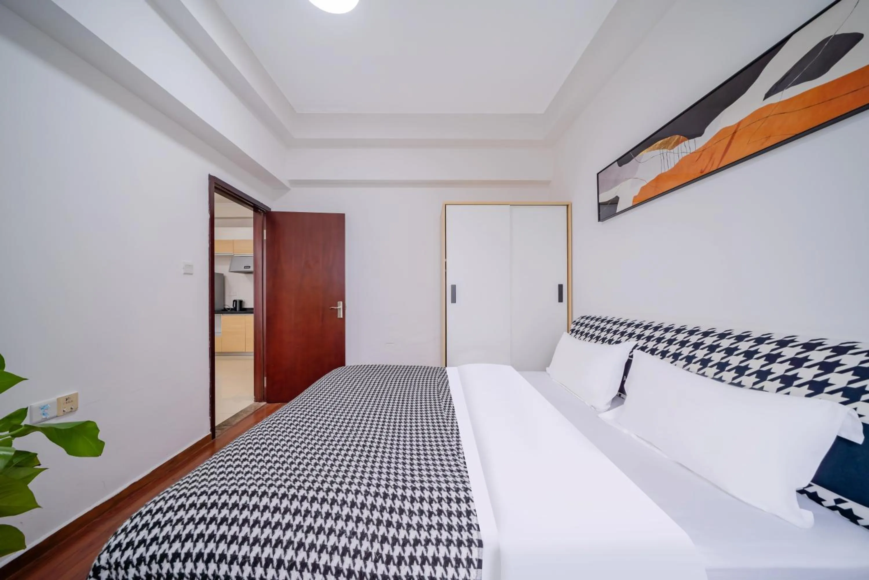 Bedroom in Guangzhou Lijing Aparthotel Pazhou Exhibition Center - Next to Exit D of Wanshengwei MTR Station