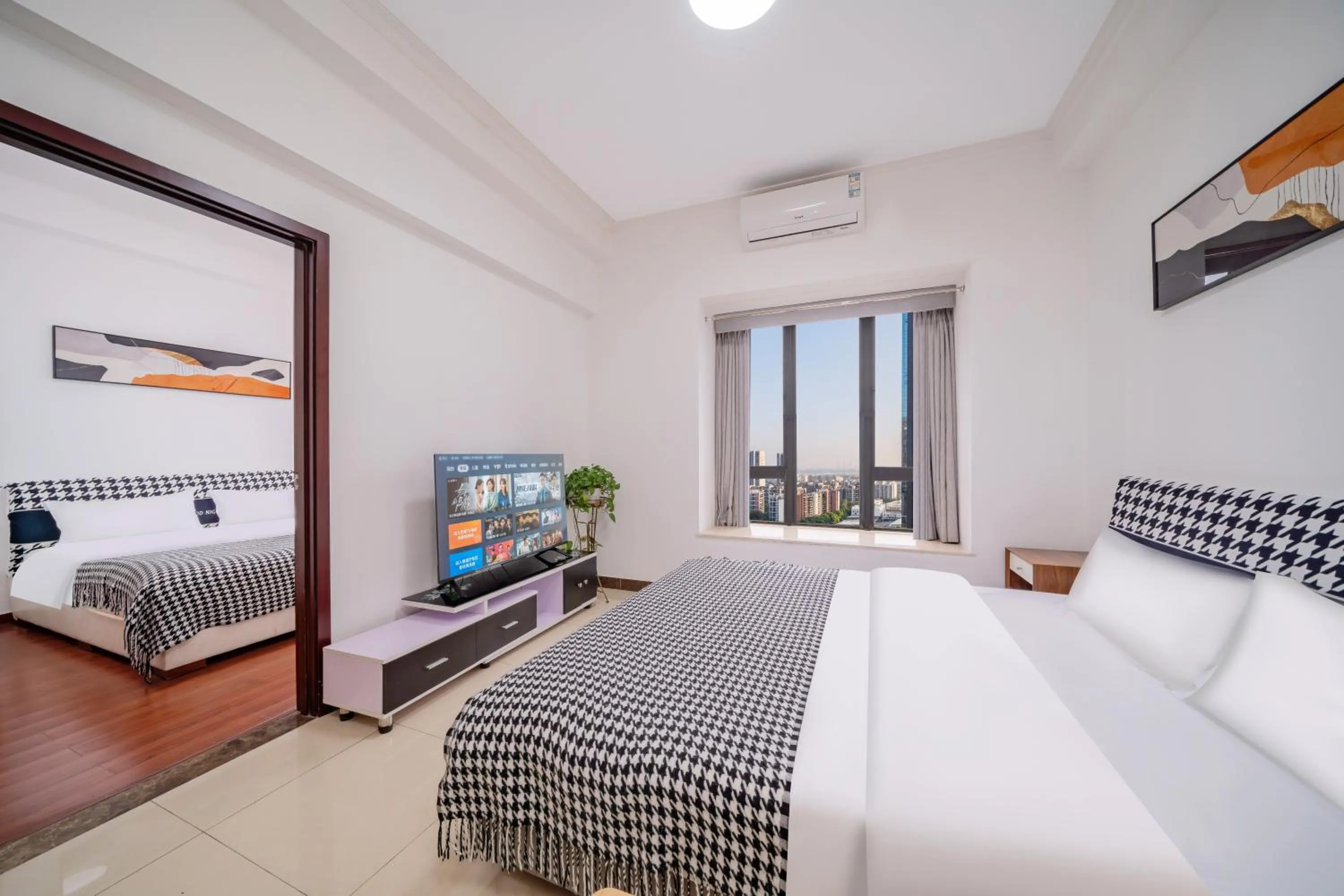 TV and multimedia in Guangzhou Lijing Aparthotel Pazhou Exhibition Center - Next to Exit D of Wanshengwei MTR Station