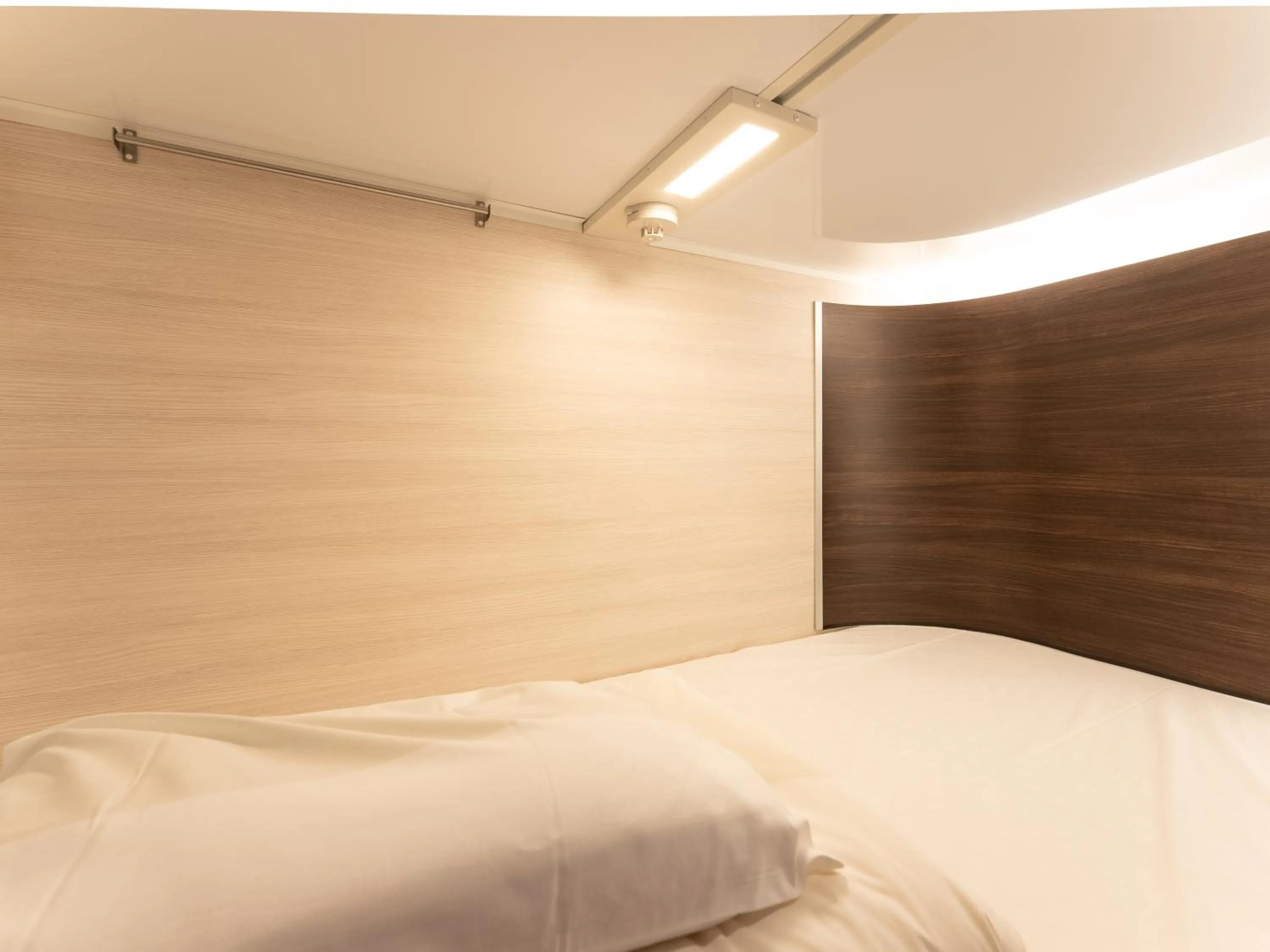 Photo of the whole room, Bed in Tabist MAYUDAMA CABIN