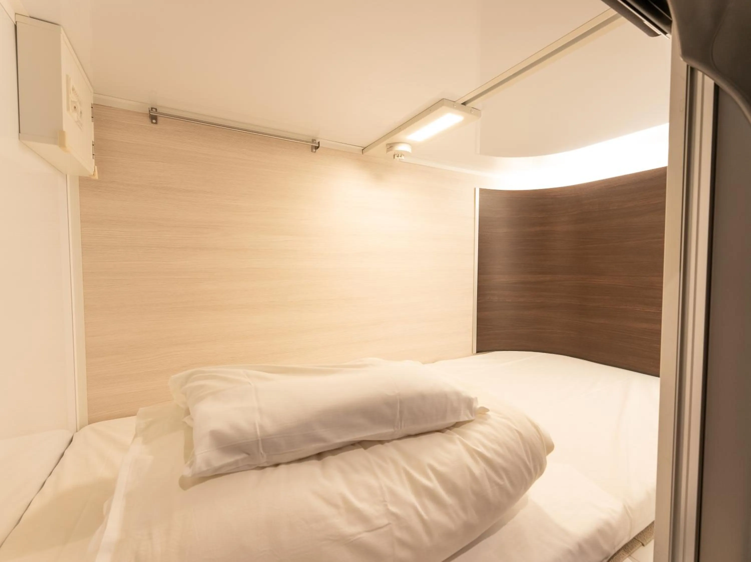 Photo of the whole room, Bed in Tabist MAYUDAMA CABIN