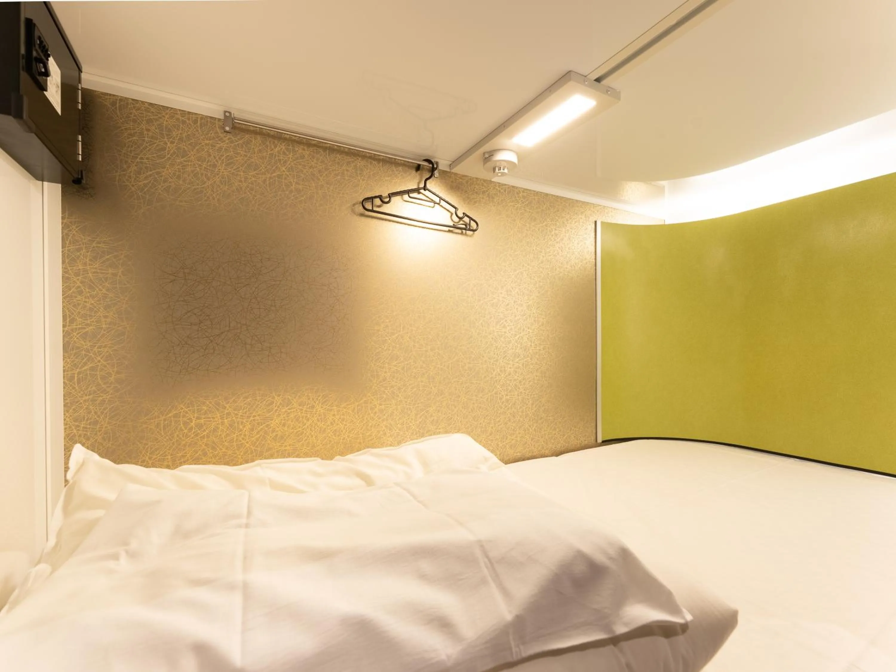 Photo of the whole room, Bed in Tabist MAYUDAMA CABIN