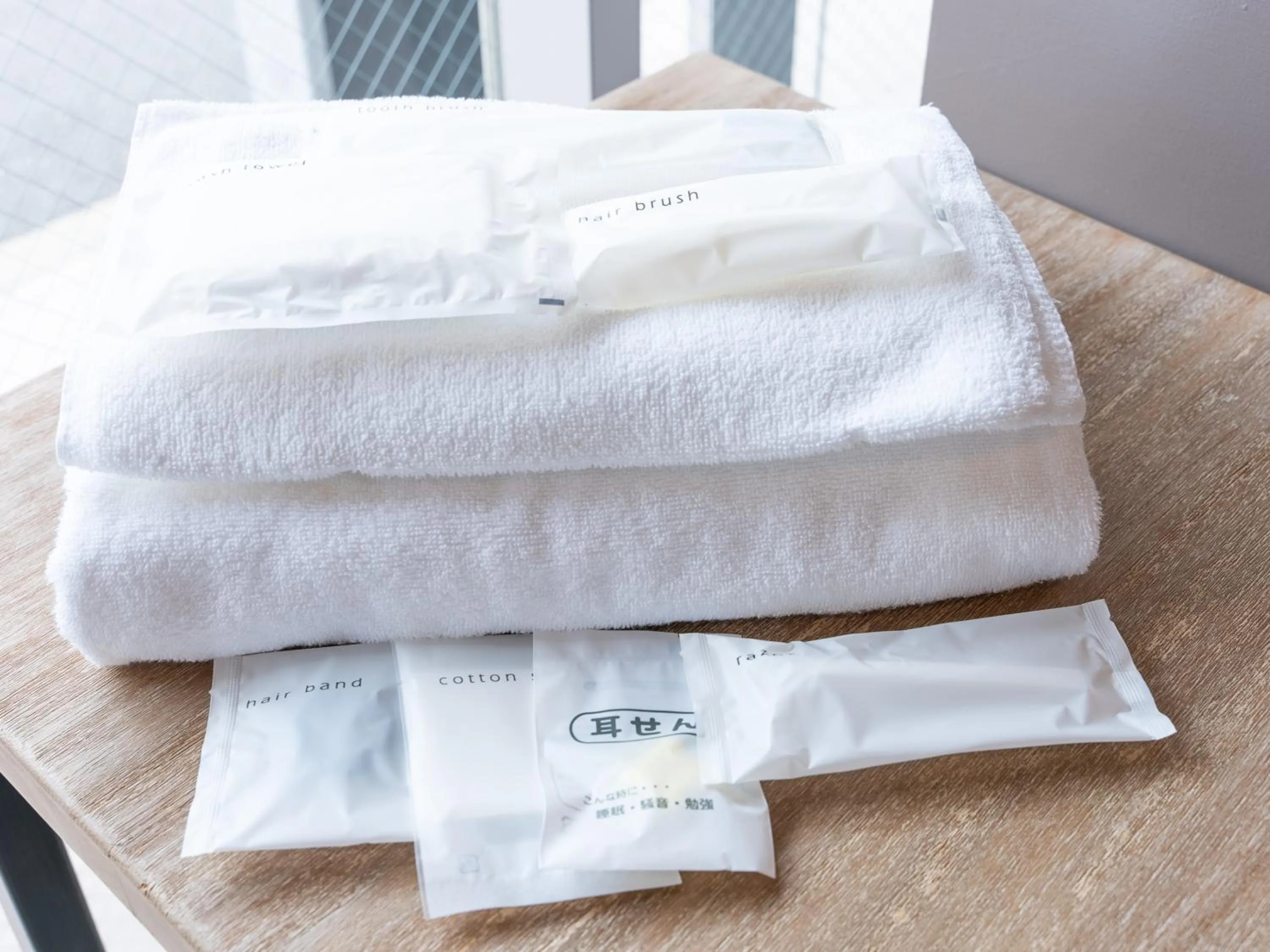 towels, Bed in Tabist MAYUDAMA CABIN