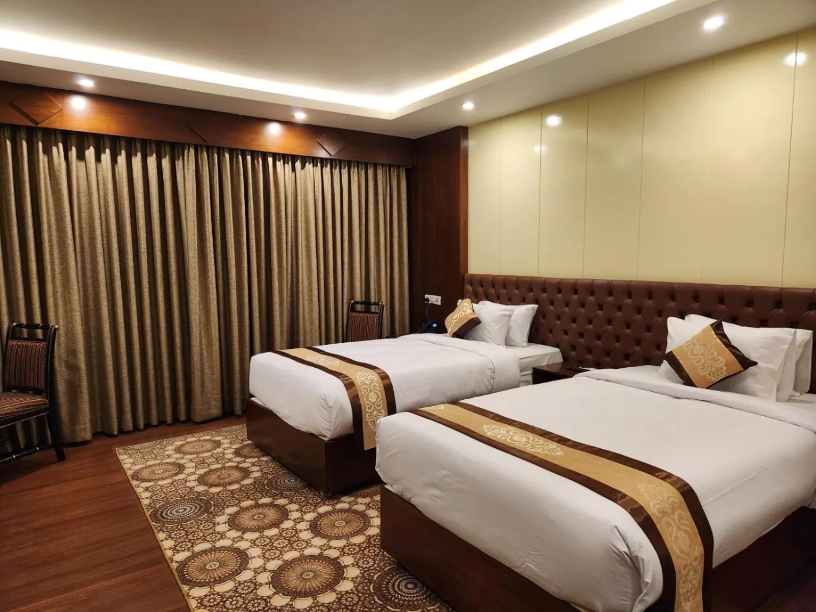 Bed in Paragon Hotel & Resort
