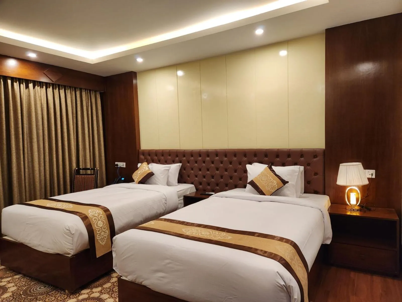 Bed in Paragon Hotel & Resort