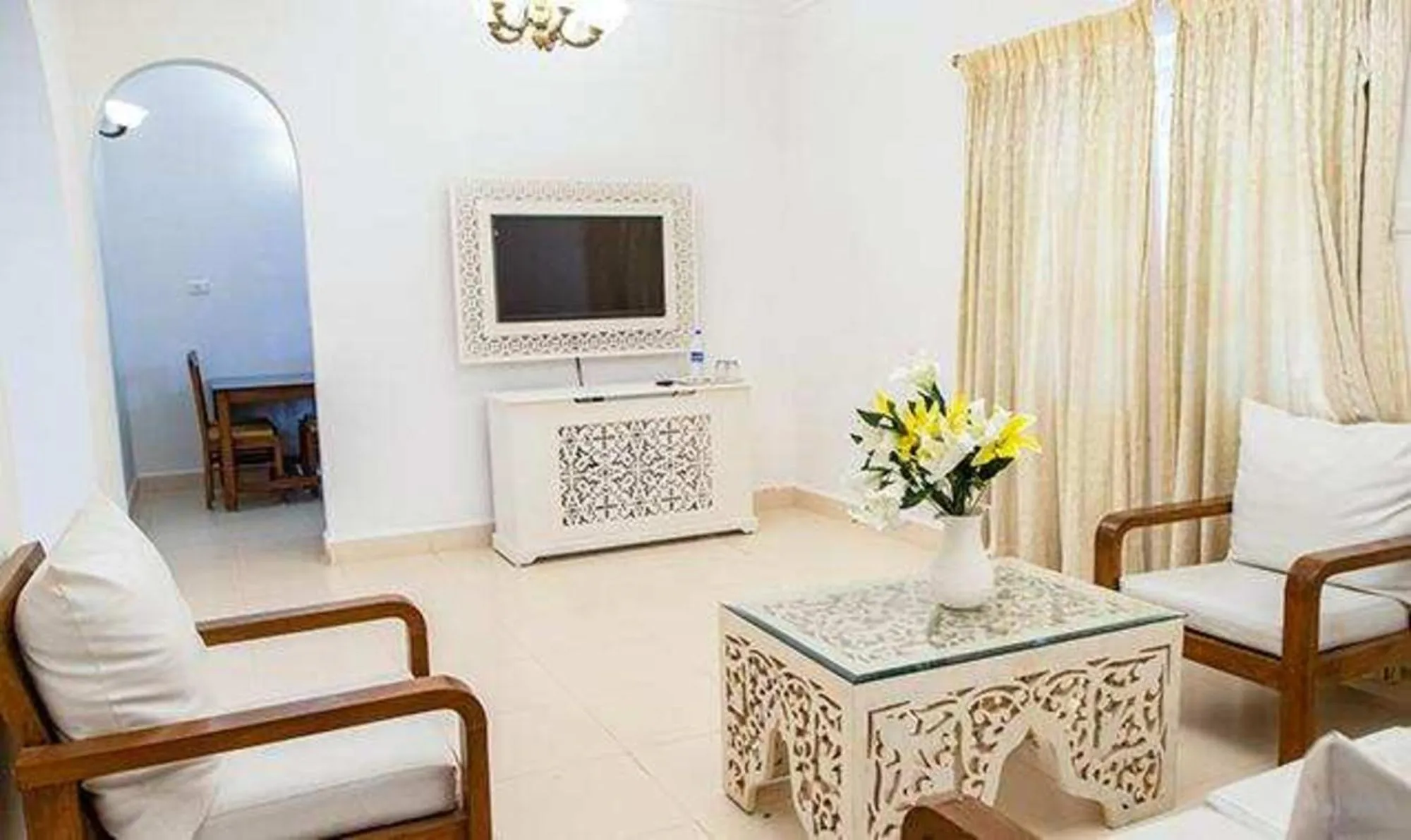 TV and multimedia in Via Toro Highland Beach Resort With Pool - 500M From Candolim Beach