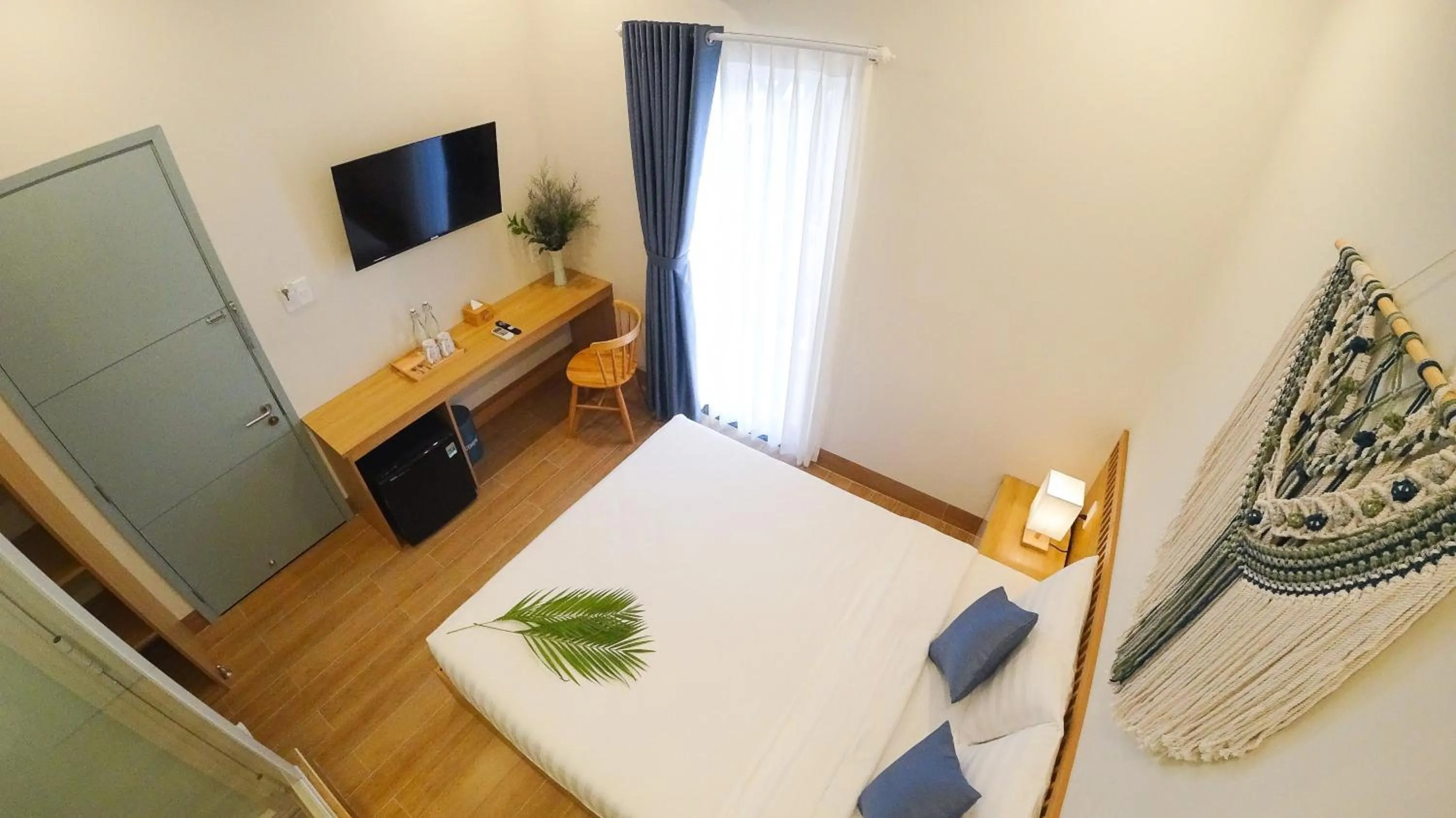 Photo of the whole room, Bed in Vy's House Phanthiet Hotel