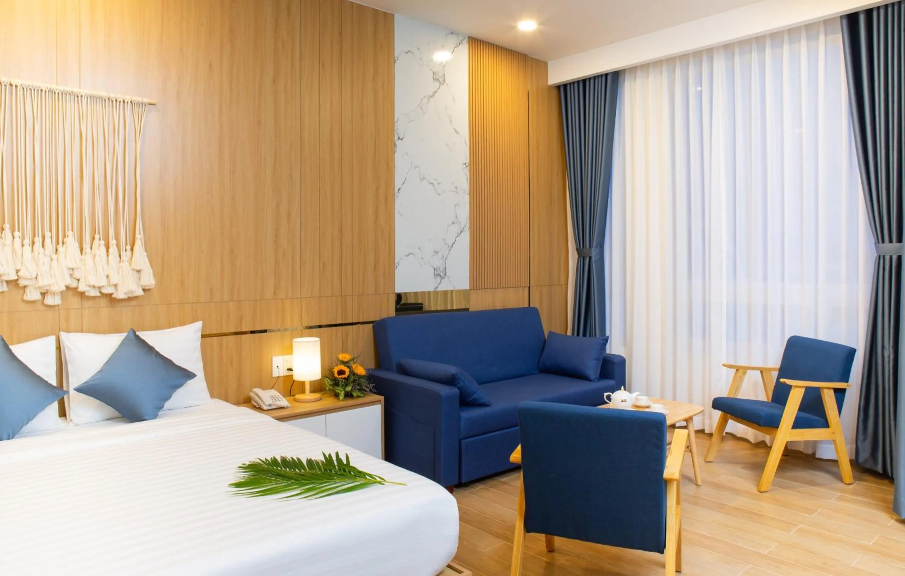 Photo of the whole room in Vy's House Phanthiet Hotel