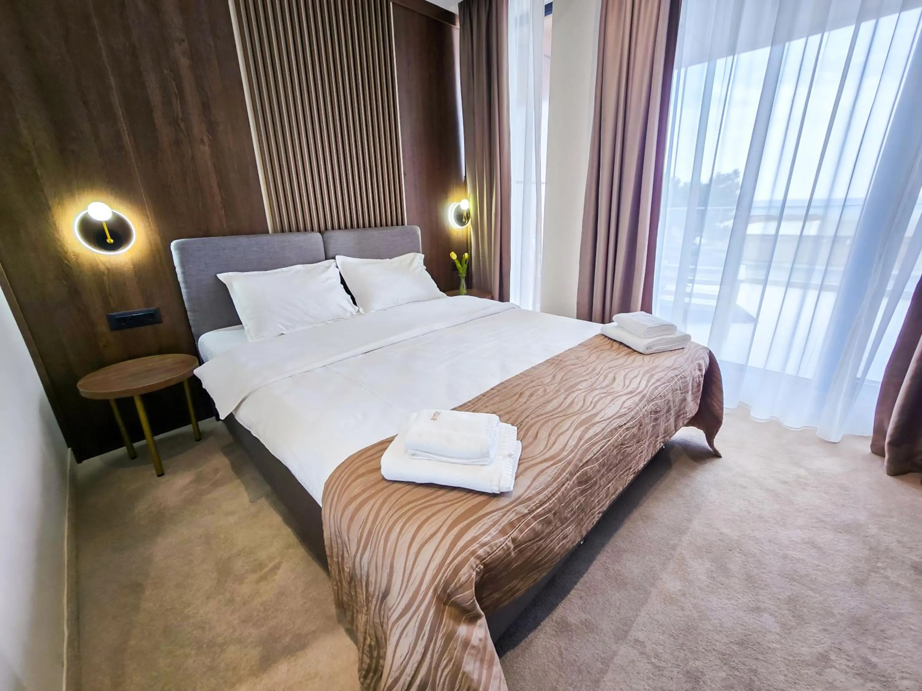 Bed in Sonio Boutique Hotel