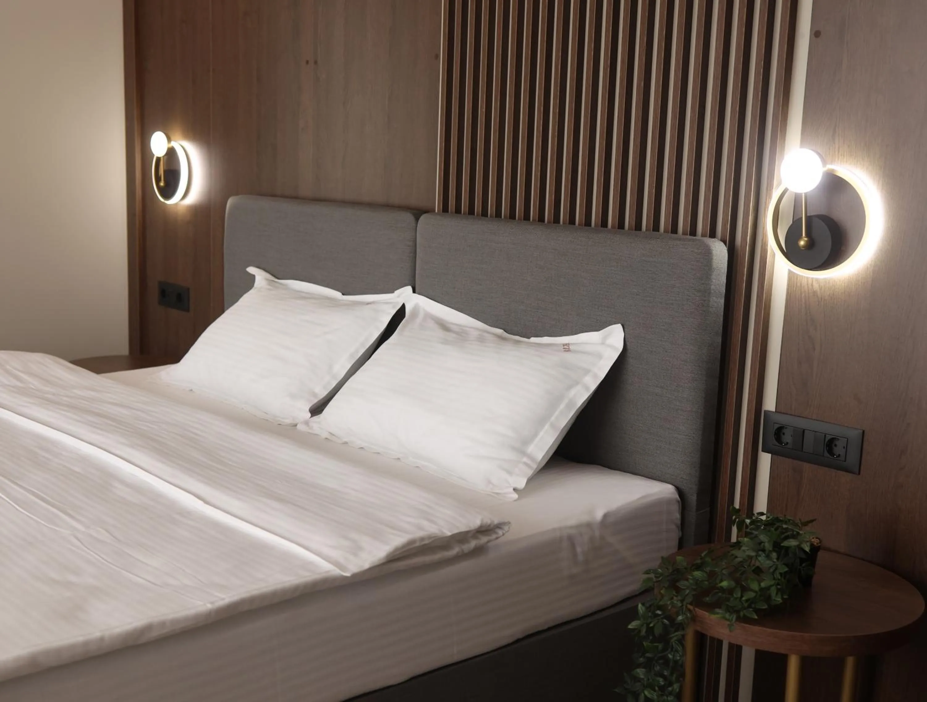 Bed in Sonio Boutique Hotel