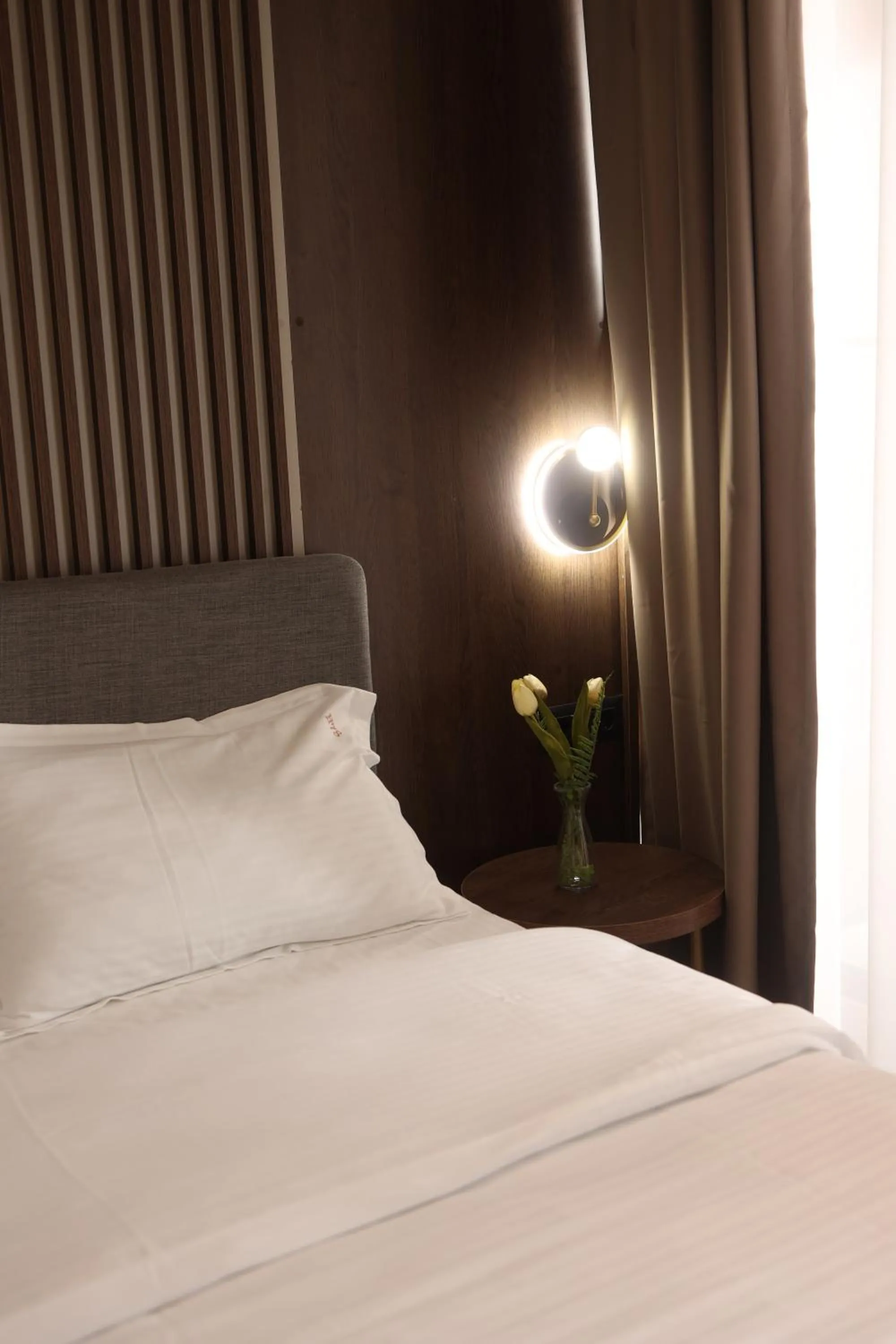 Bed in Sonio Boutique Hotel