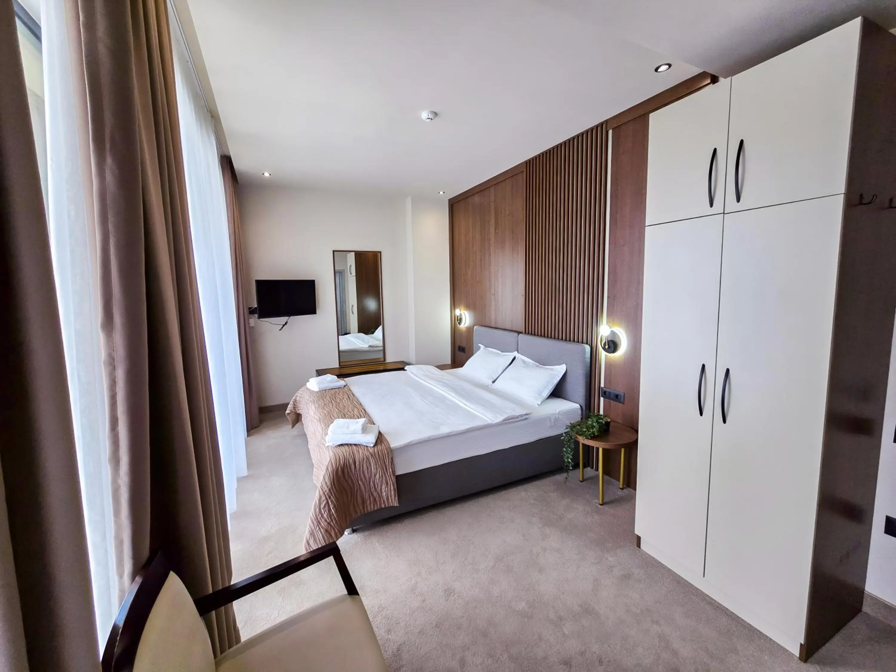 Bed in Sonio Boutique Hotel