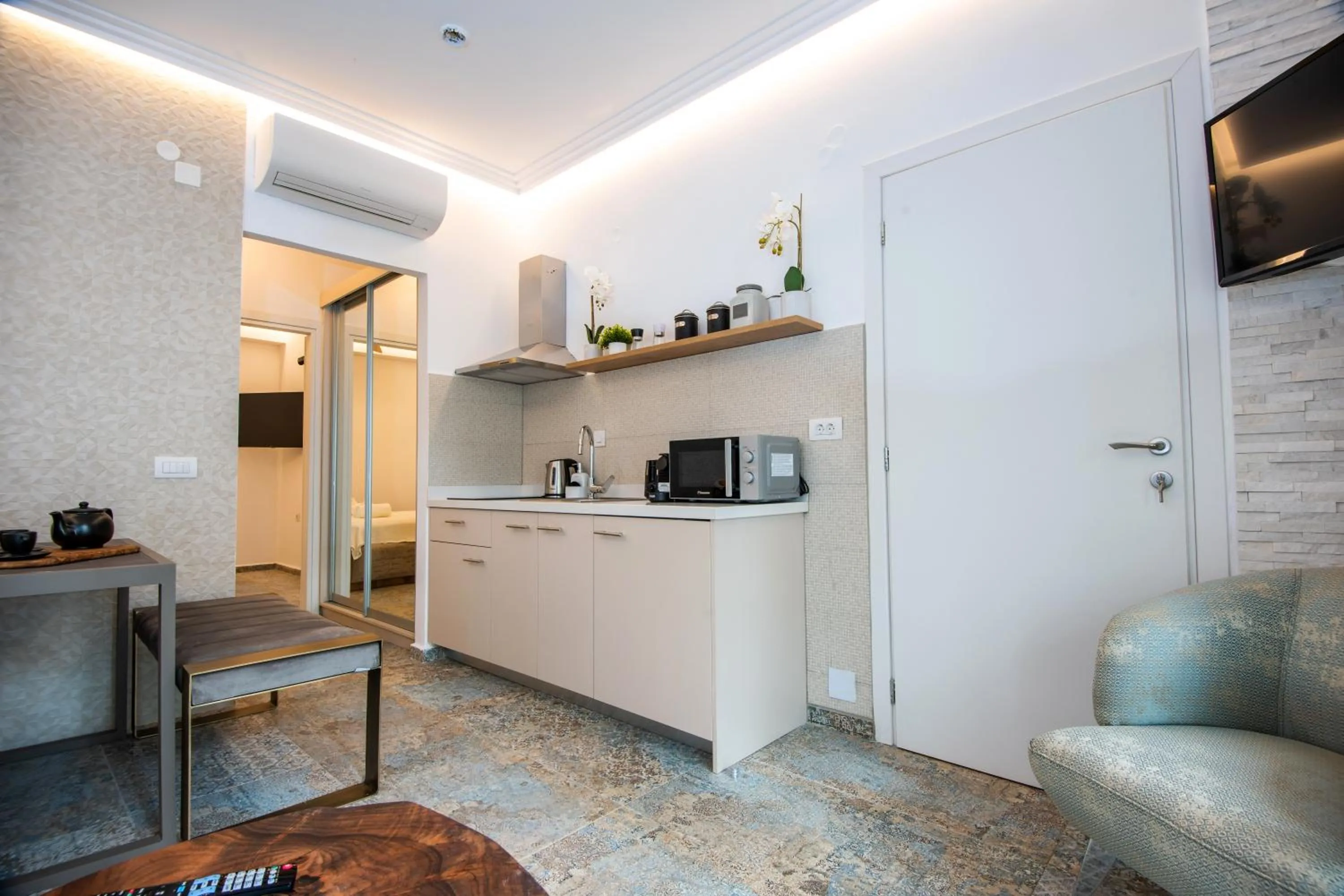 Kitchen or kitchenette in Beach Walk Luxury Suites