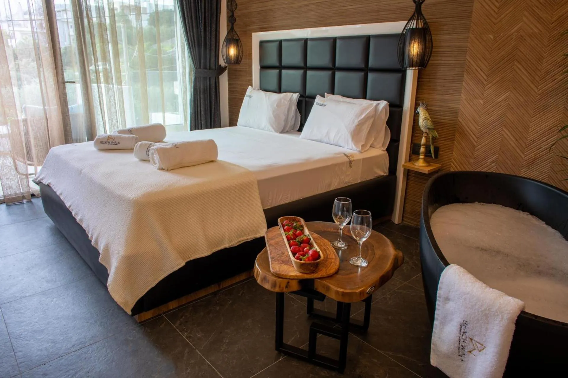 Bed in Beach Walk Luxury Suites