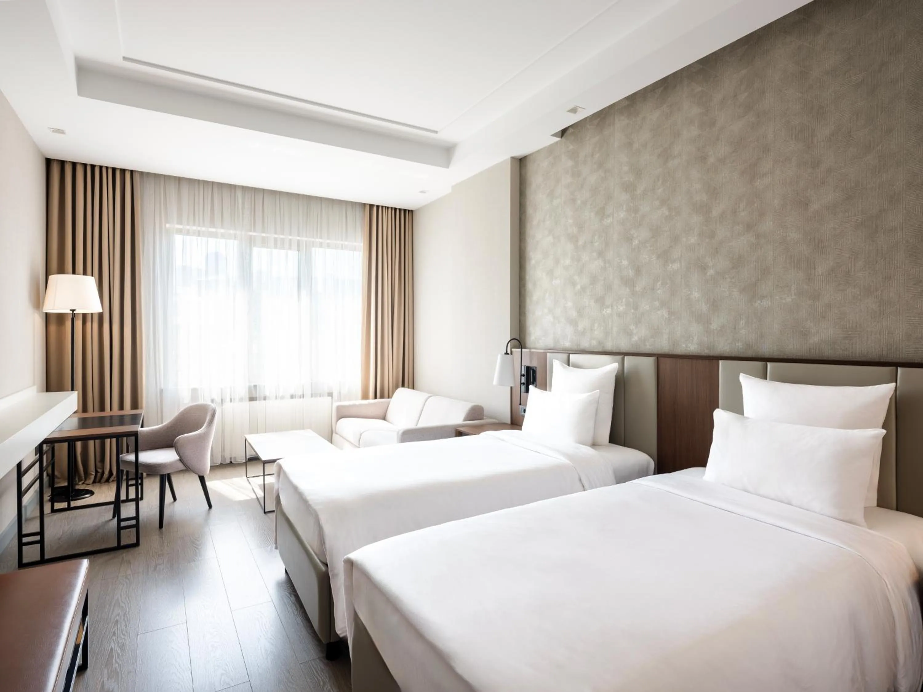 Bed in CityLife Boutique Hotel