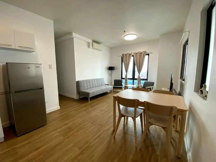 Living room, Bed in Modern Condo Apt in Flair Tower South, Mandaluyong
