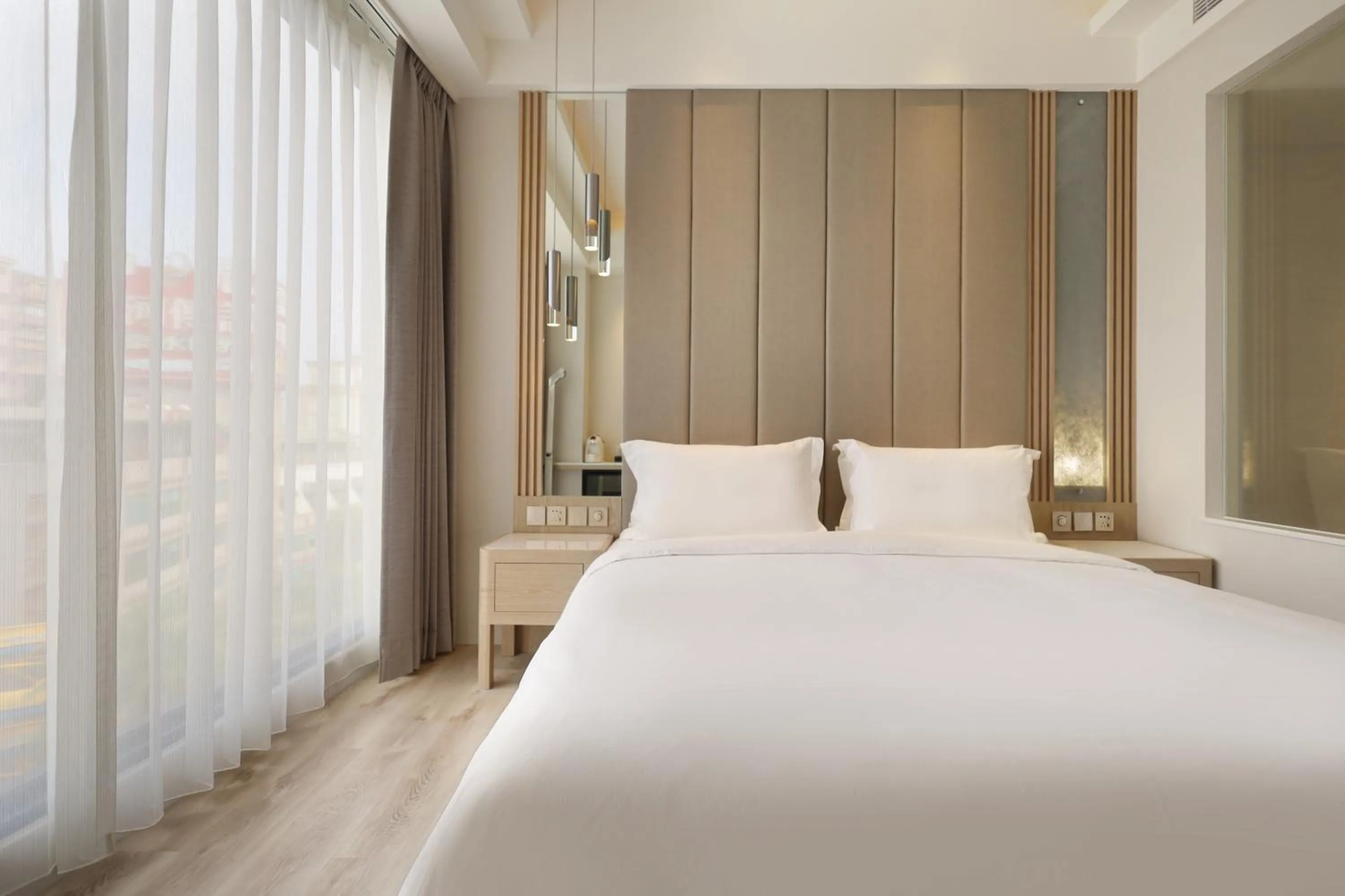 Bed in Gamalan Star Hotel