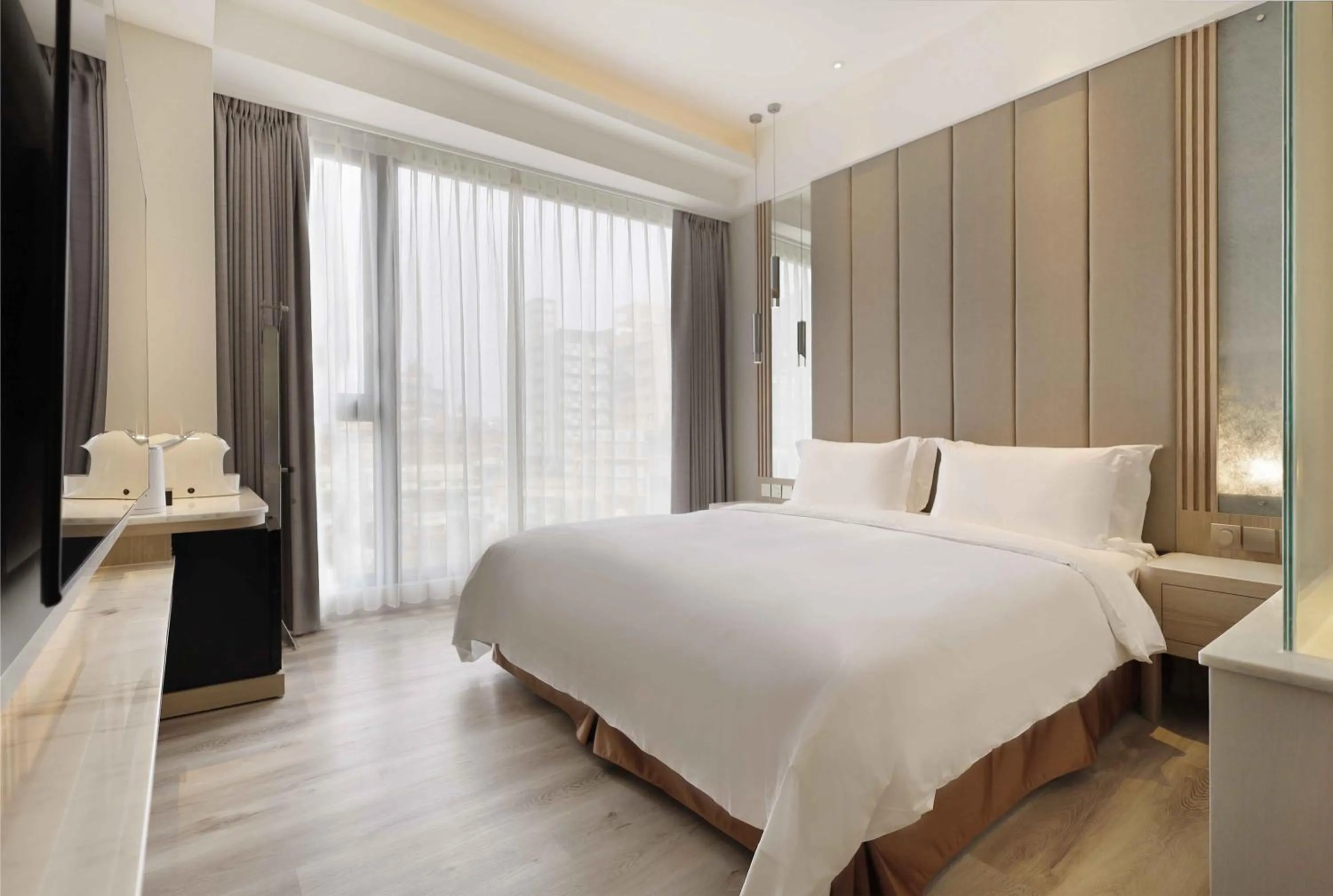 Bed in Gamalan Star Hotel