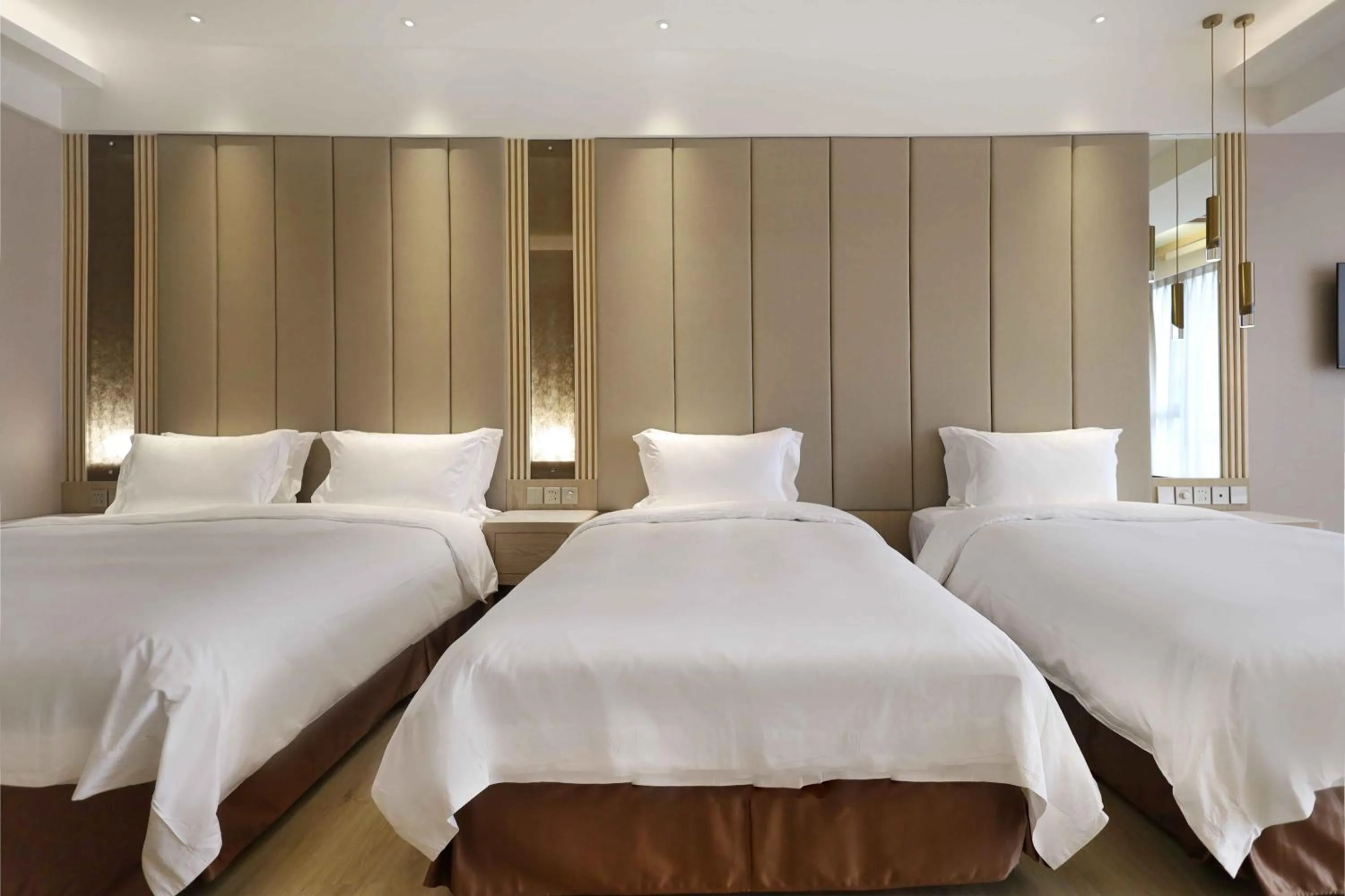 Bed in Gamalan Star Hotel