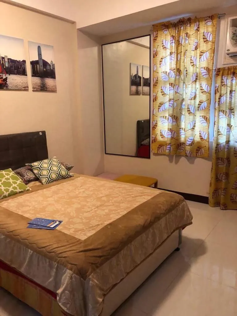 Bed in 101 Newport Boulevard-Favila Condotel Unit near Airport