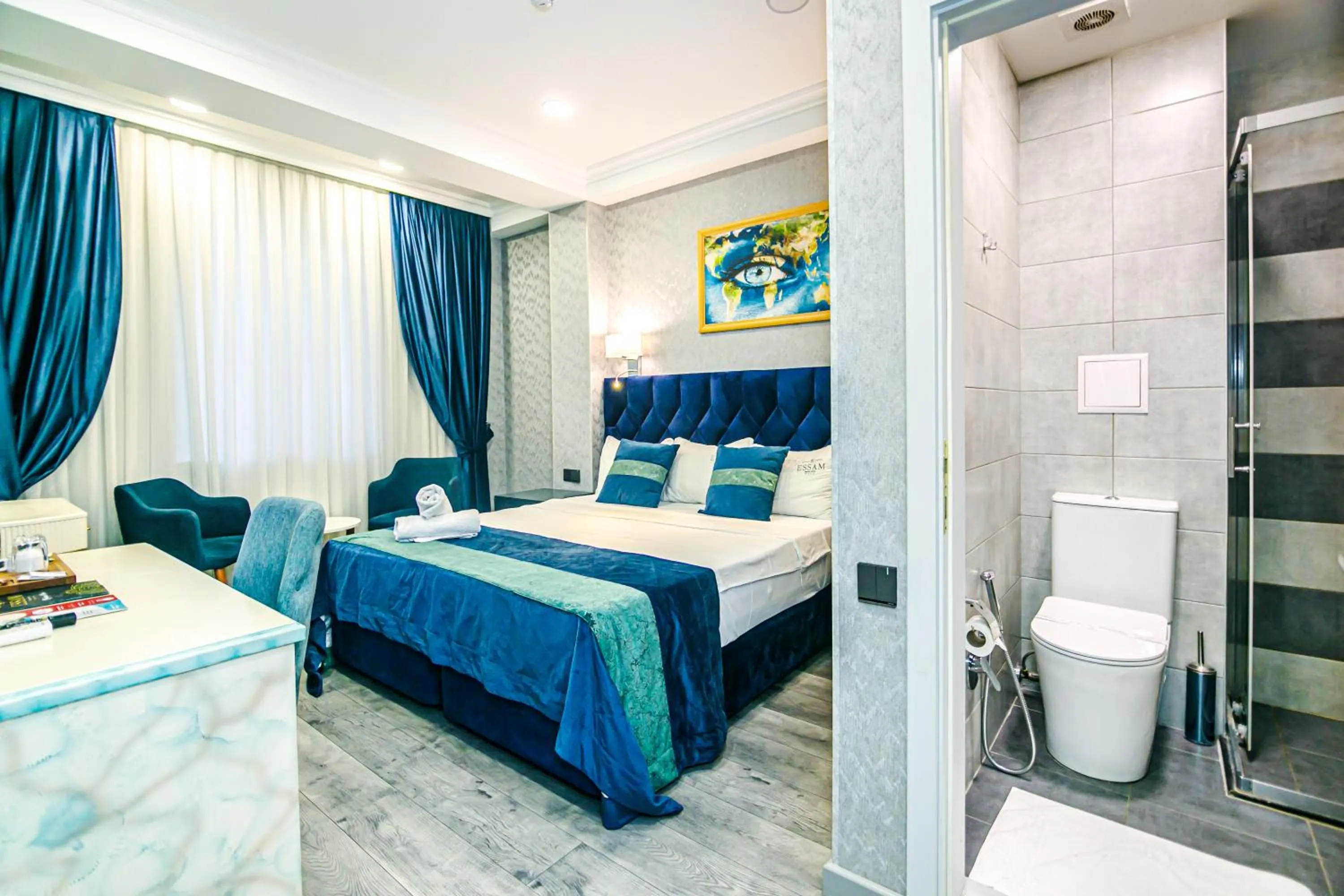 Photo of the whole room, Bed in Essam Deluxe Hotel