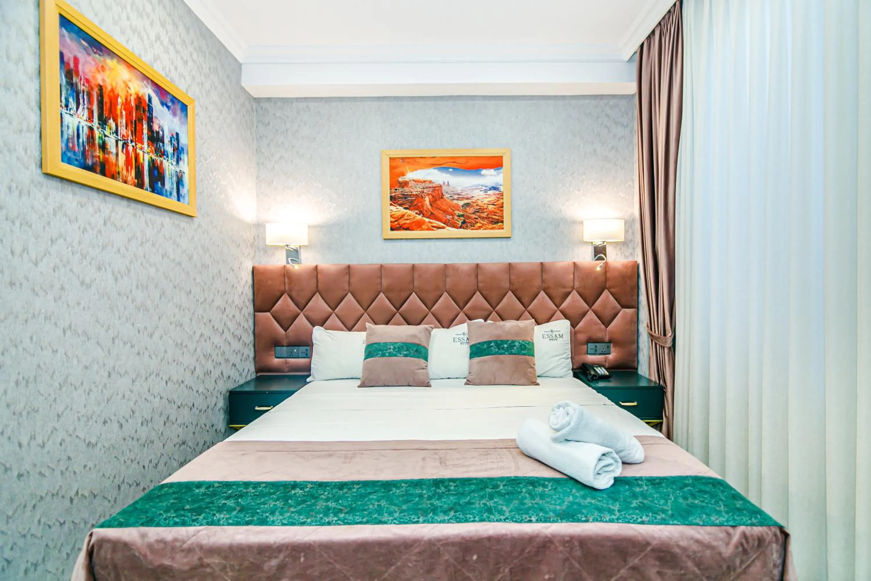 Photo of the whole room, Bed in Essam Deluxe Hotel