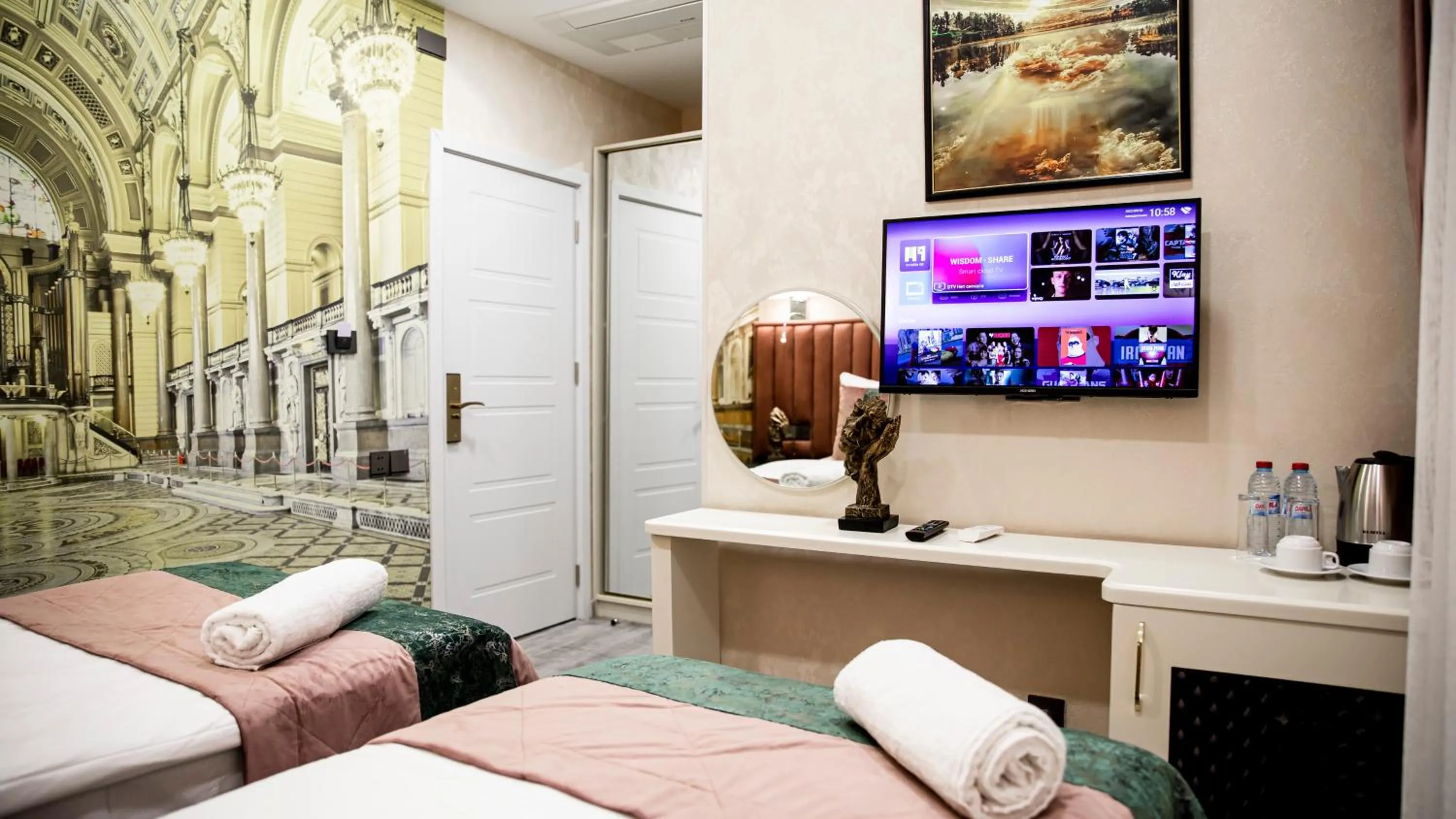 Bed in Essam Deluxe Hotel